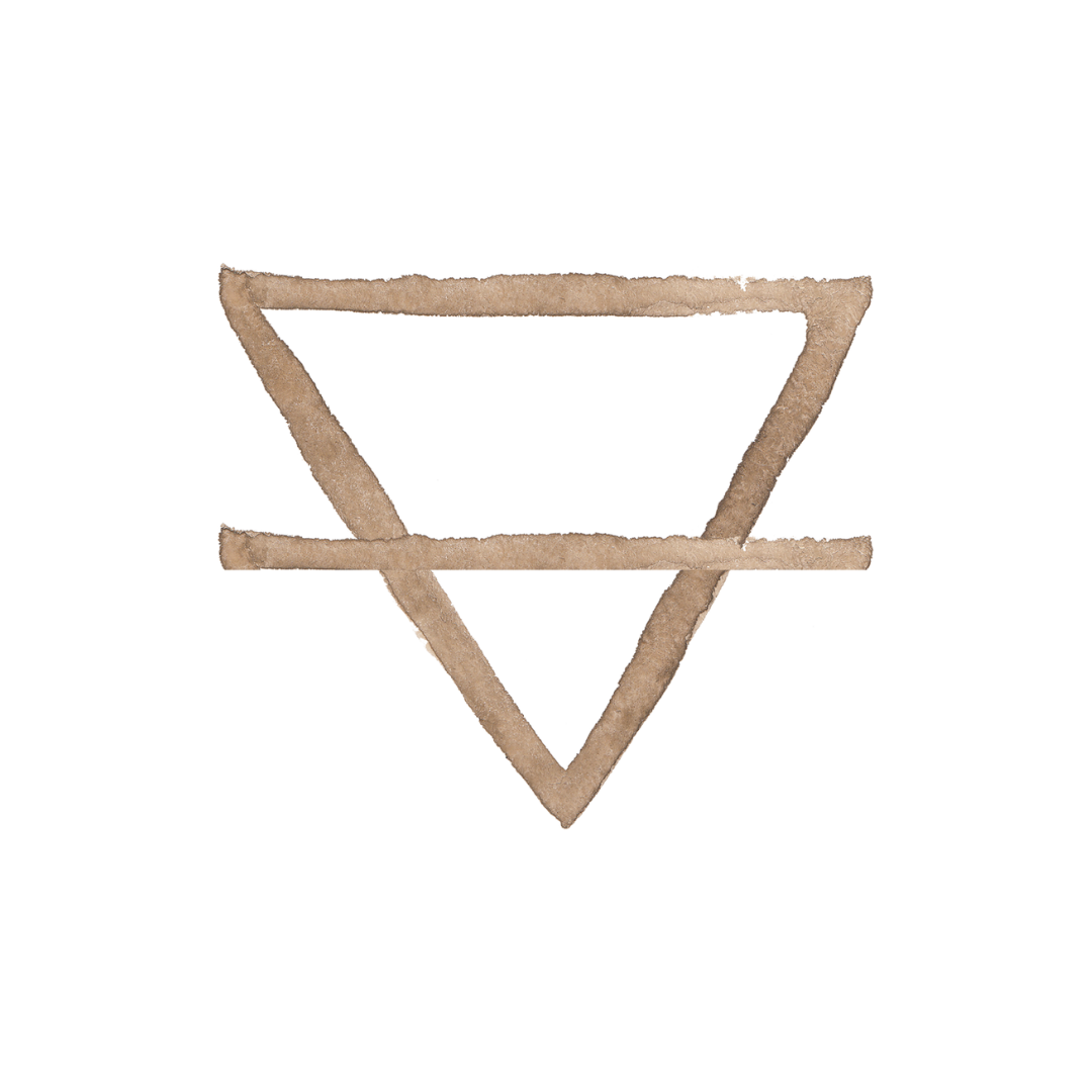 A triangle-shaped object made of brown, rough material, with two horizontal lines crossing it.