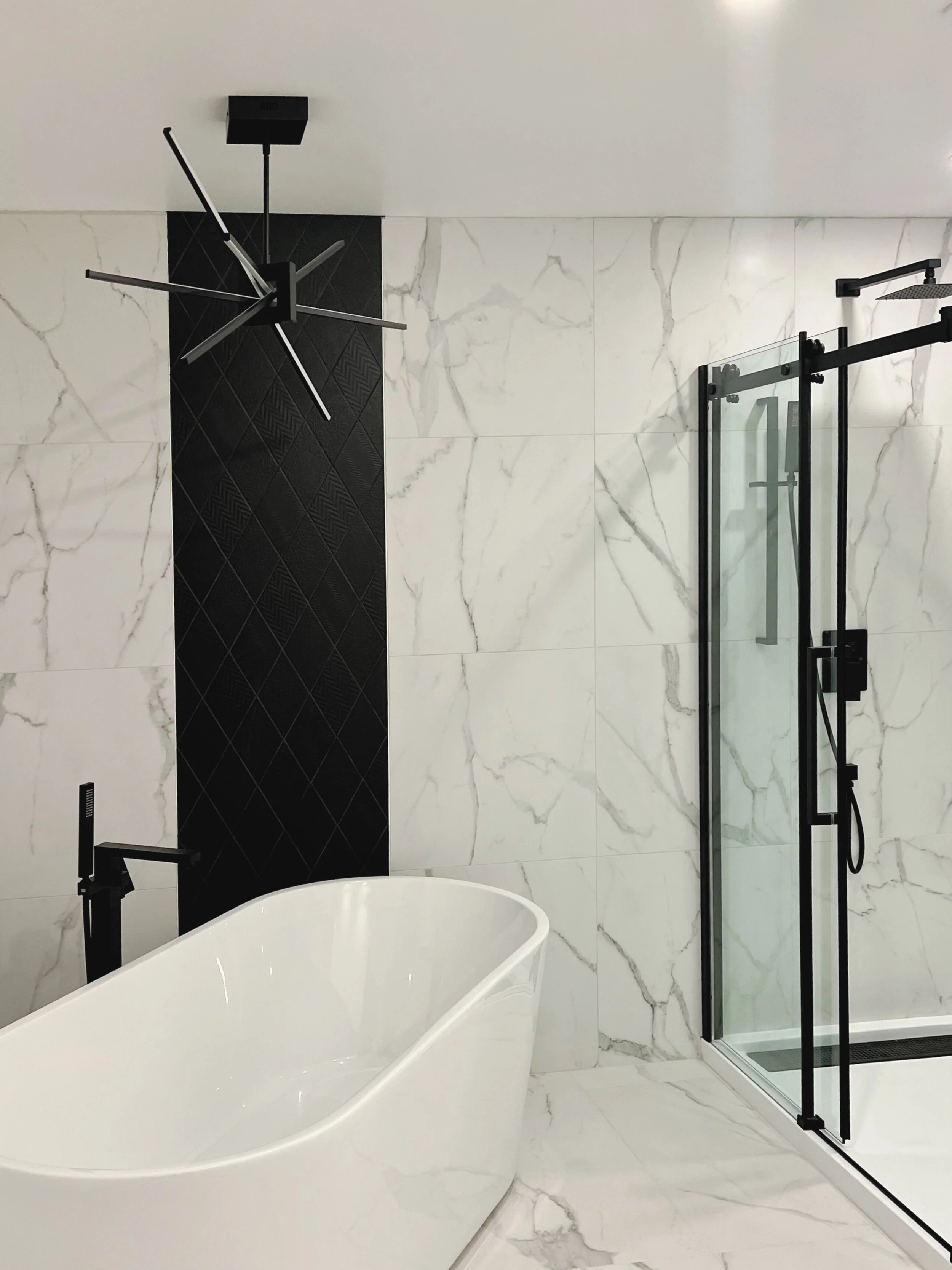 Modern ensuite bathroom renovation in DDO with glass shower and custom vanity