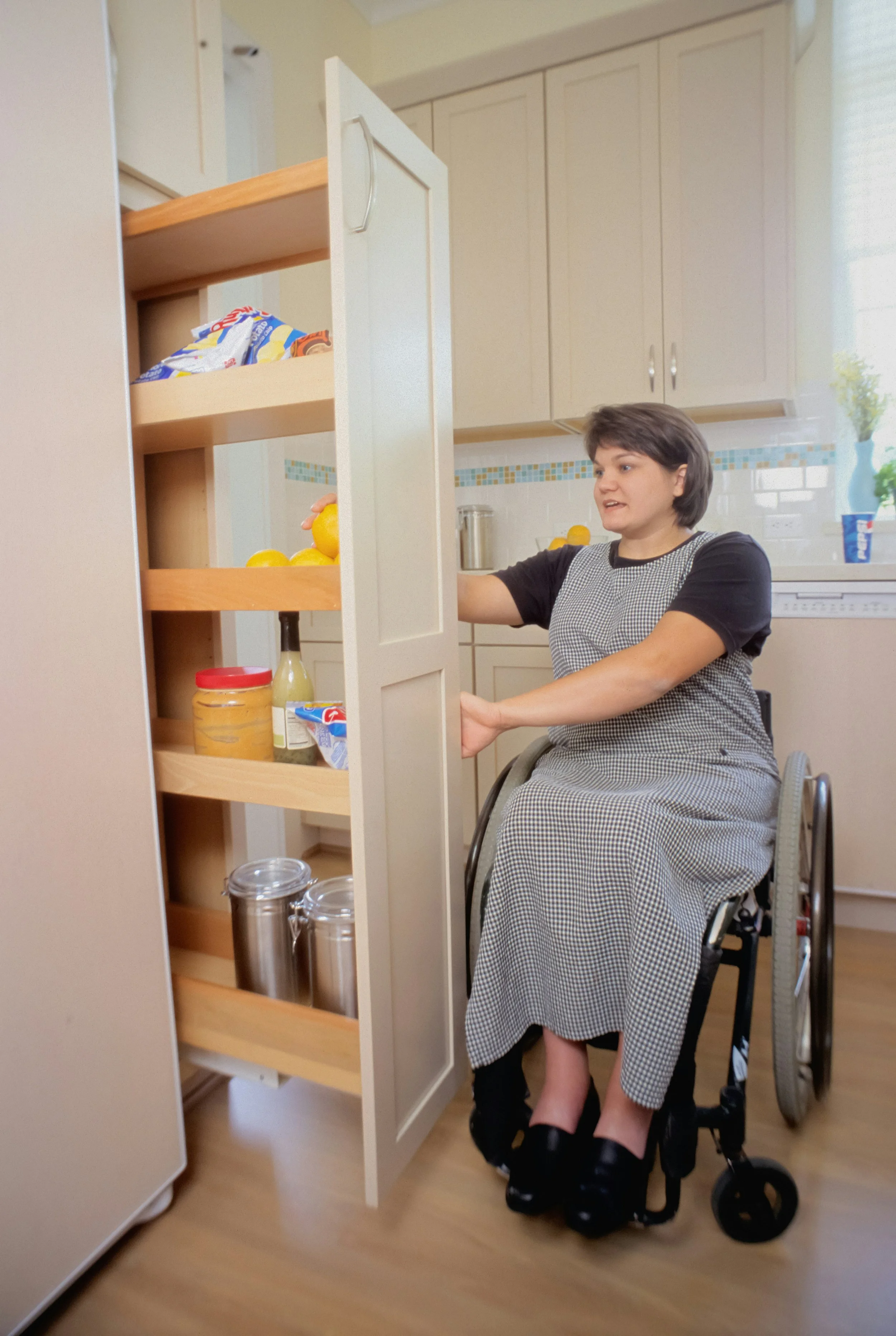 Photo by <a href="https://unsplash.com/@cdc?utm_source=unsplash&utm_medium=referral&utm_content=creditCopyText">CDC</a> on <a href="https://unsplash.com/photos/a-woman-in-a-wheel-chair-opening-a-cabinet-ehOJSy36Rfg?utm_source=unsplash&utm_medium=refe