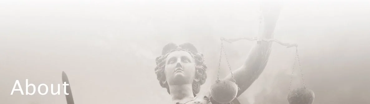 Close-up of a statue of Lady Justice holding scales.