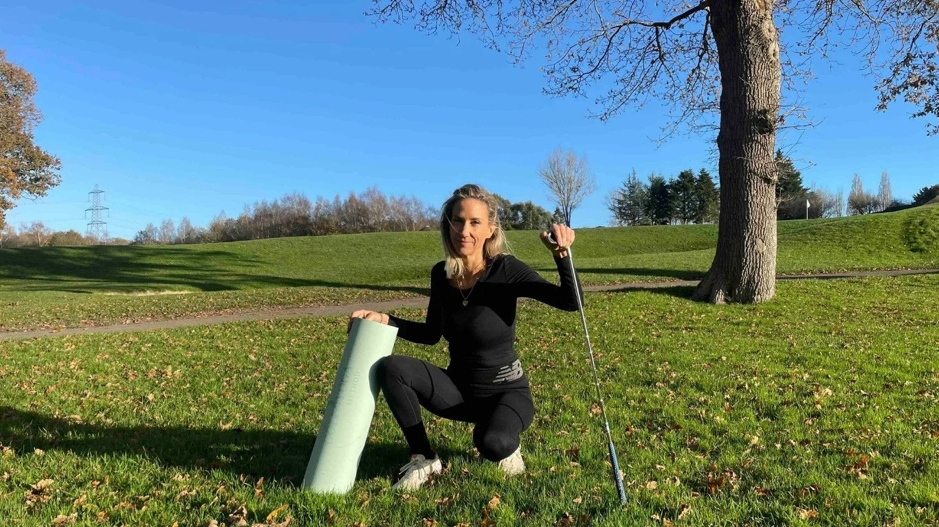 Hellen Barlow, Yoga for Golfers Advanced Coach, demonstrating golf-specific mobility exercises outdoors.