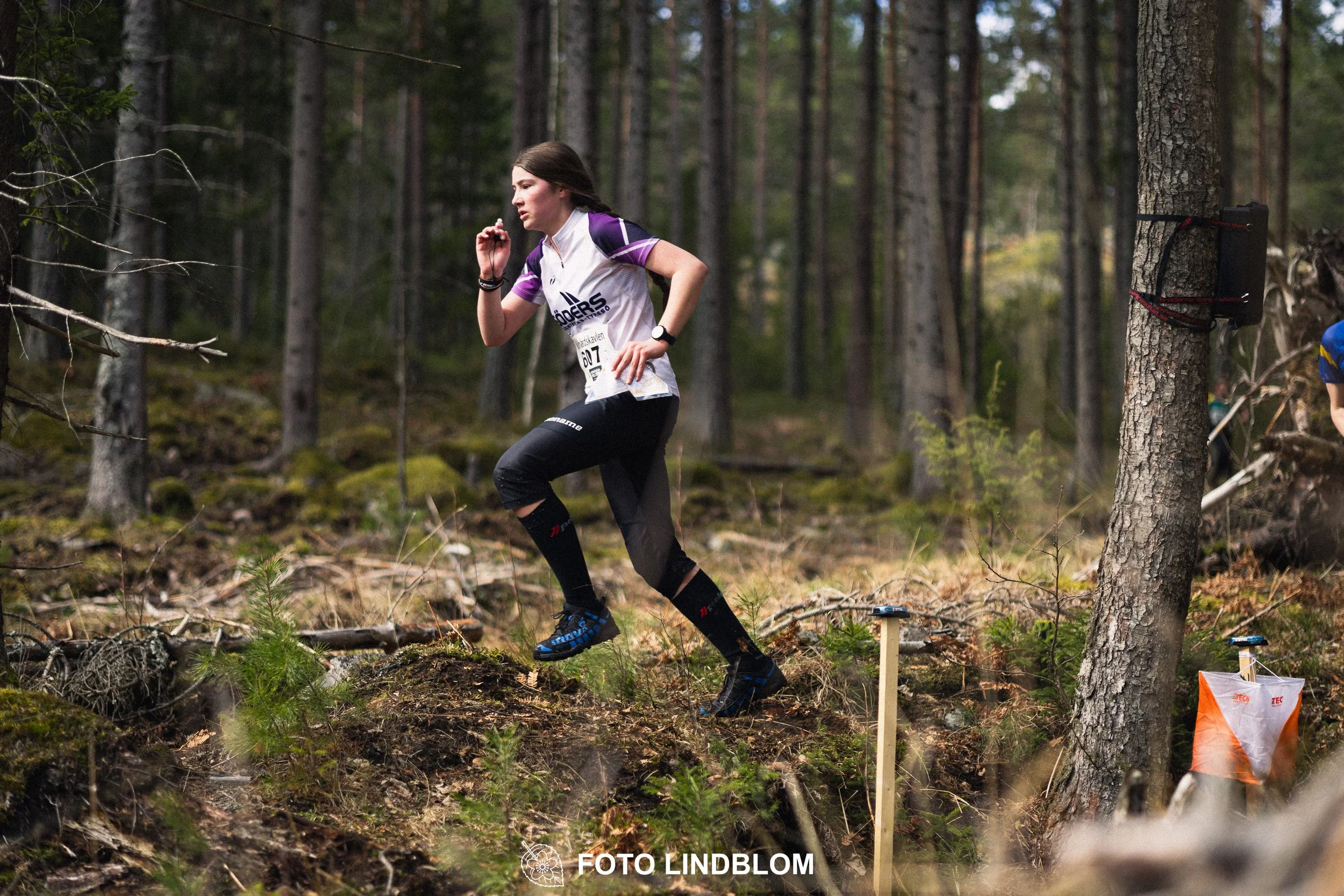 A photo from an orienteering relay race in Kolmården during spring 2026, captured by Foto Lindblom.