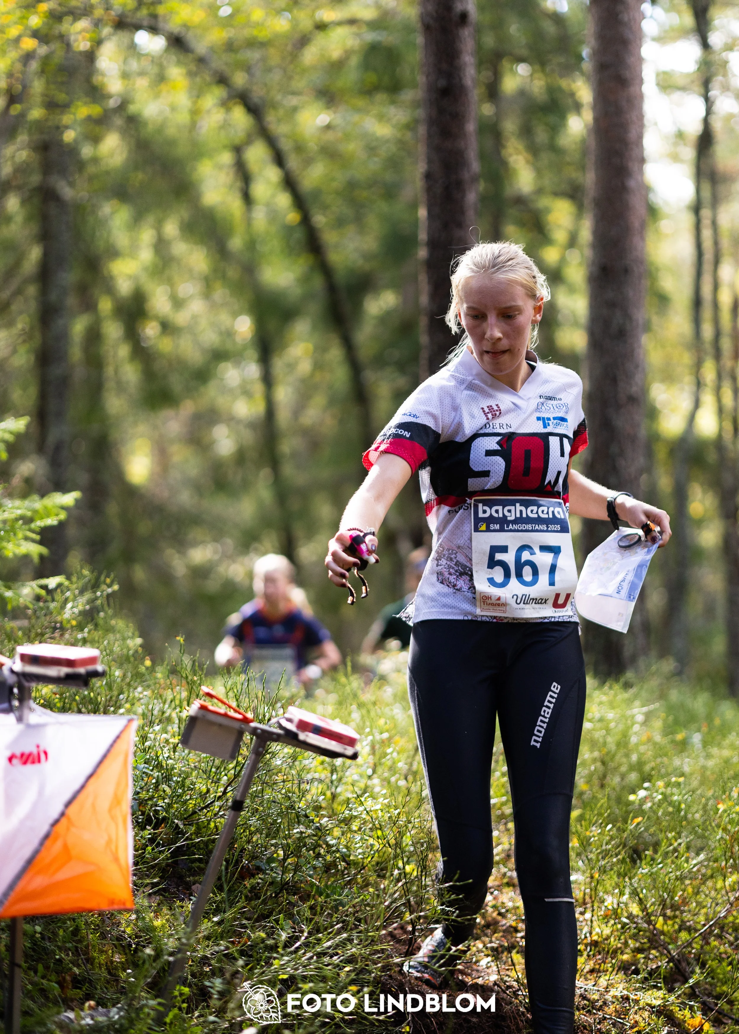 A picture from the Swedish national championship in long distance orienteering and Swedish league race taken by Foto Lindblom