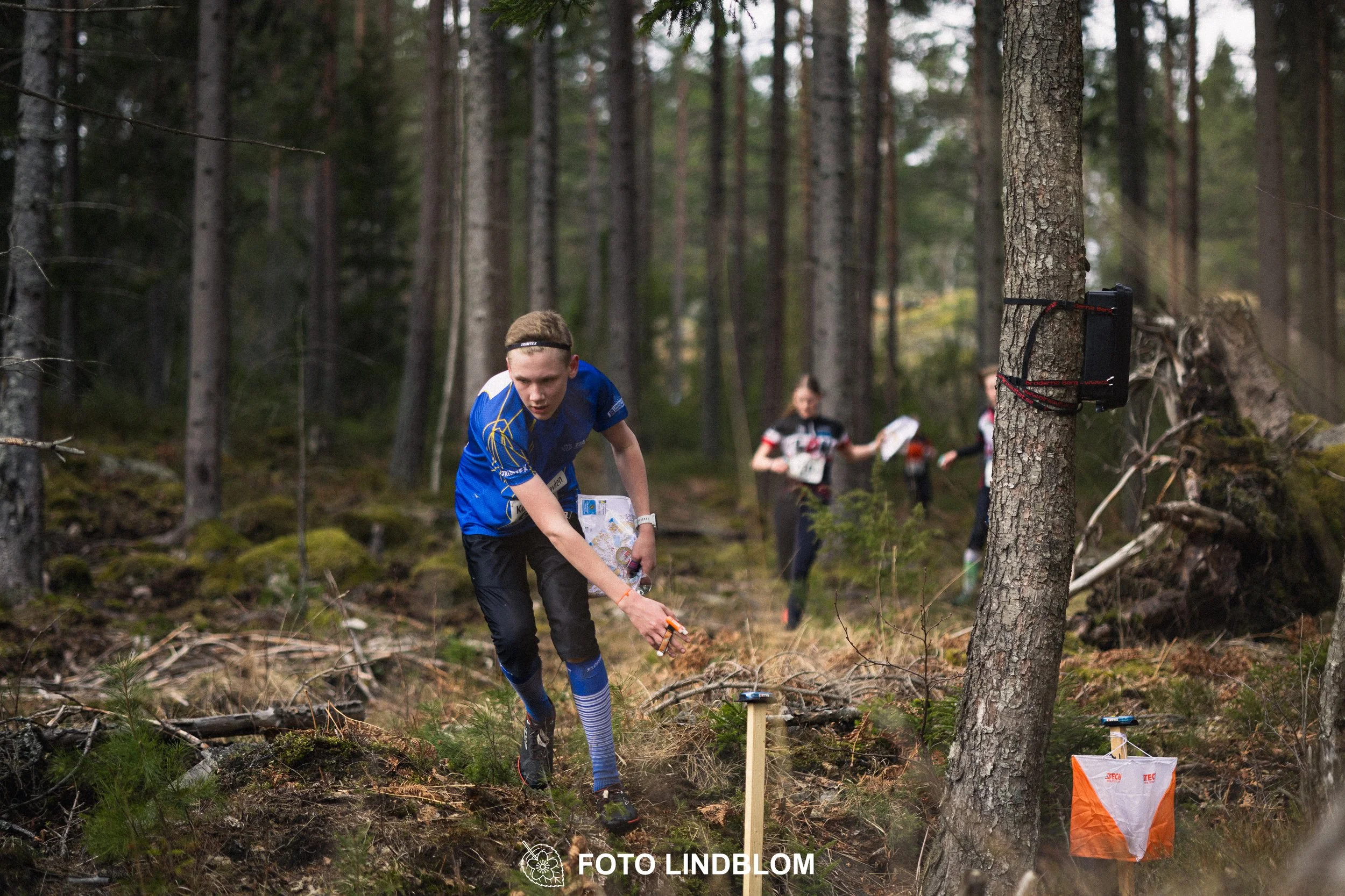 A scene from the Stafettligan relay competition Kolmårdskavlen in spring 2026, captured by Foto Lindblom.