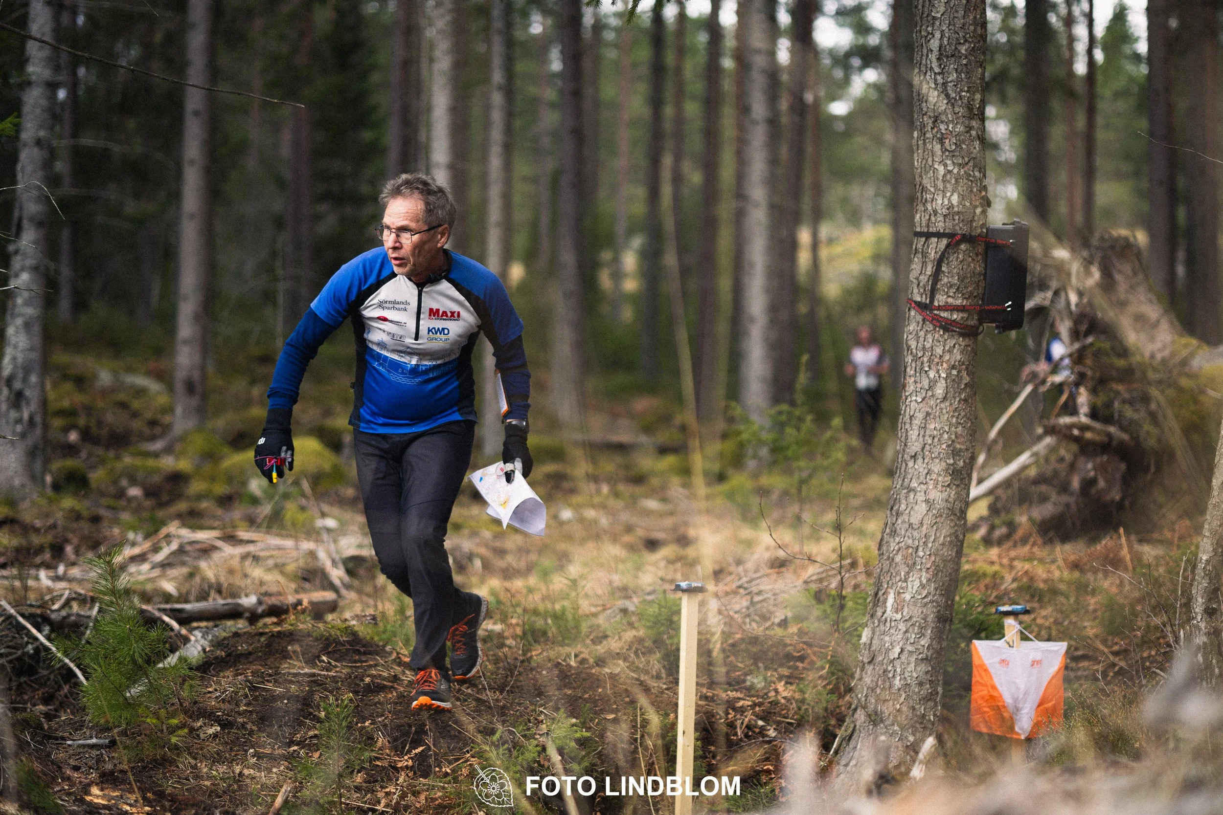 A photo from an orienteering relay race in Kolmården during spring 2026, captured by Foto Lindblom.