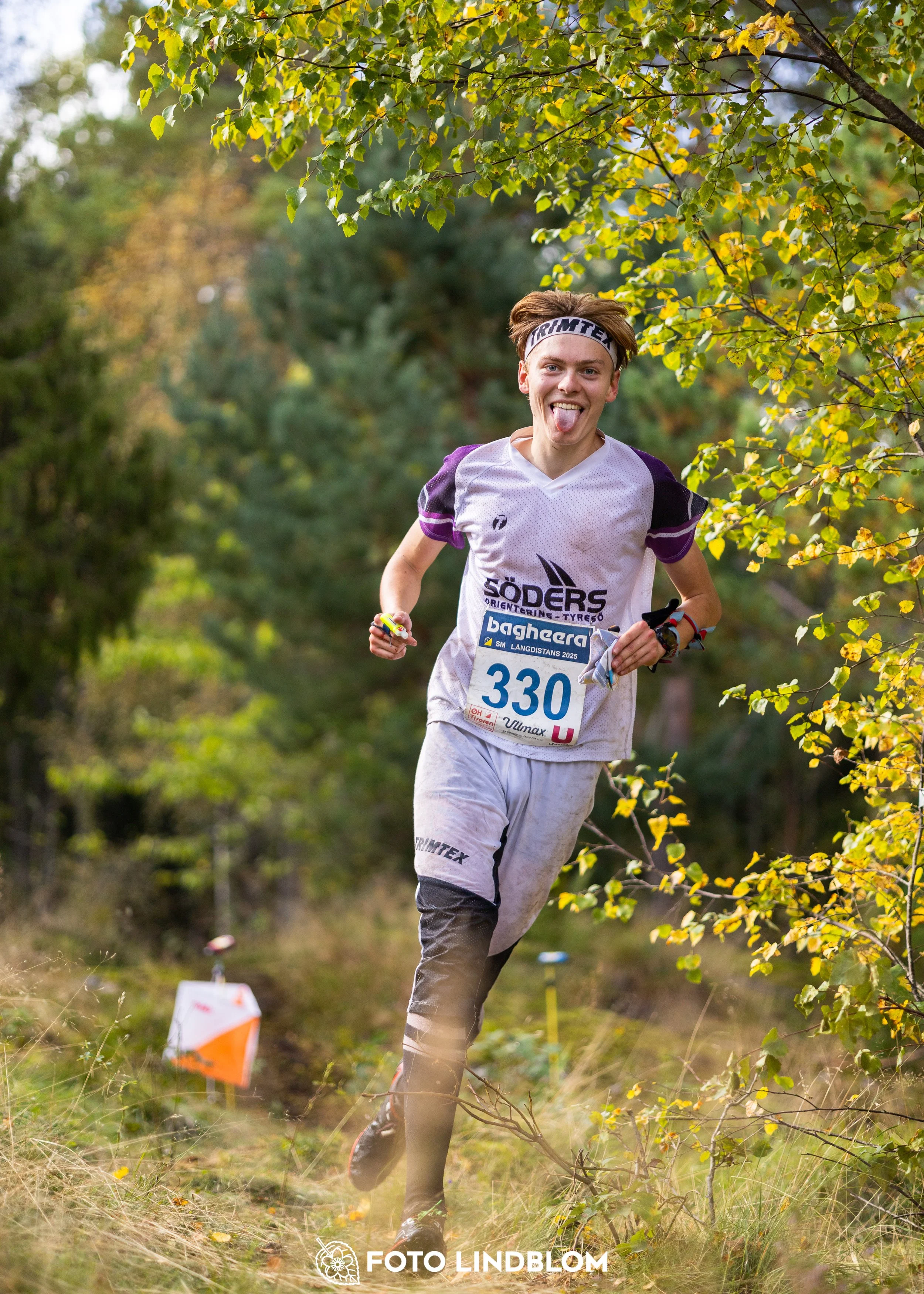 A picture from the Swedish national championship in long distance orienteering and Swedish league race taken by Foto Lindblom