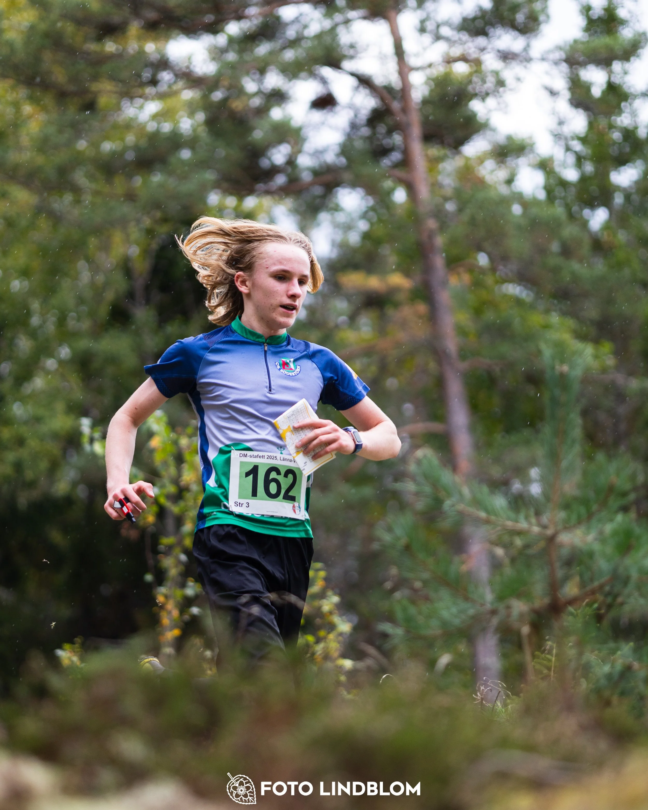 A picture from the Stockholm district championship in relay orienteering taken by Foto Lindblom