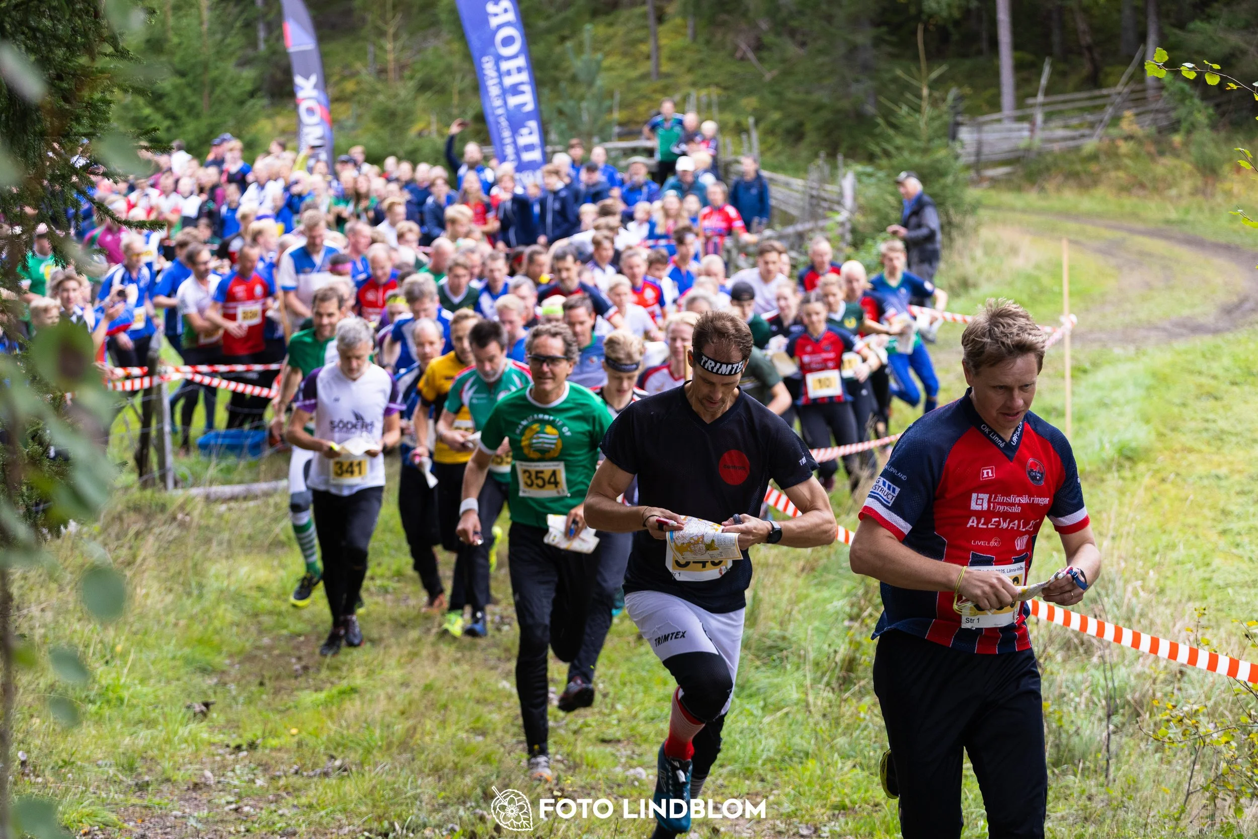 A picture from the Stockholm district championship in relay orienteering taken by Foto Lindblom