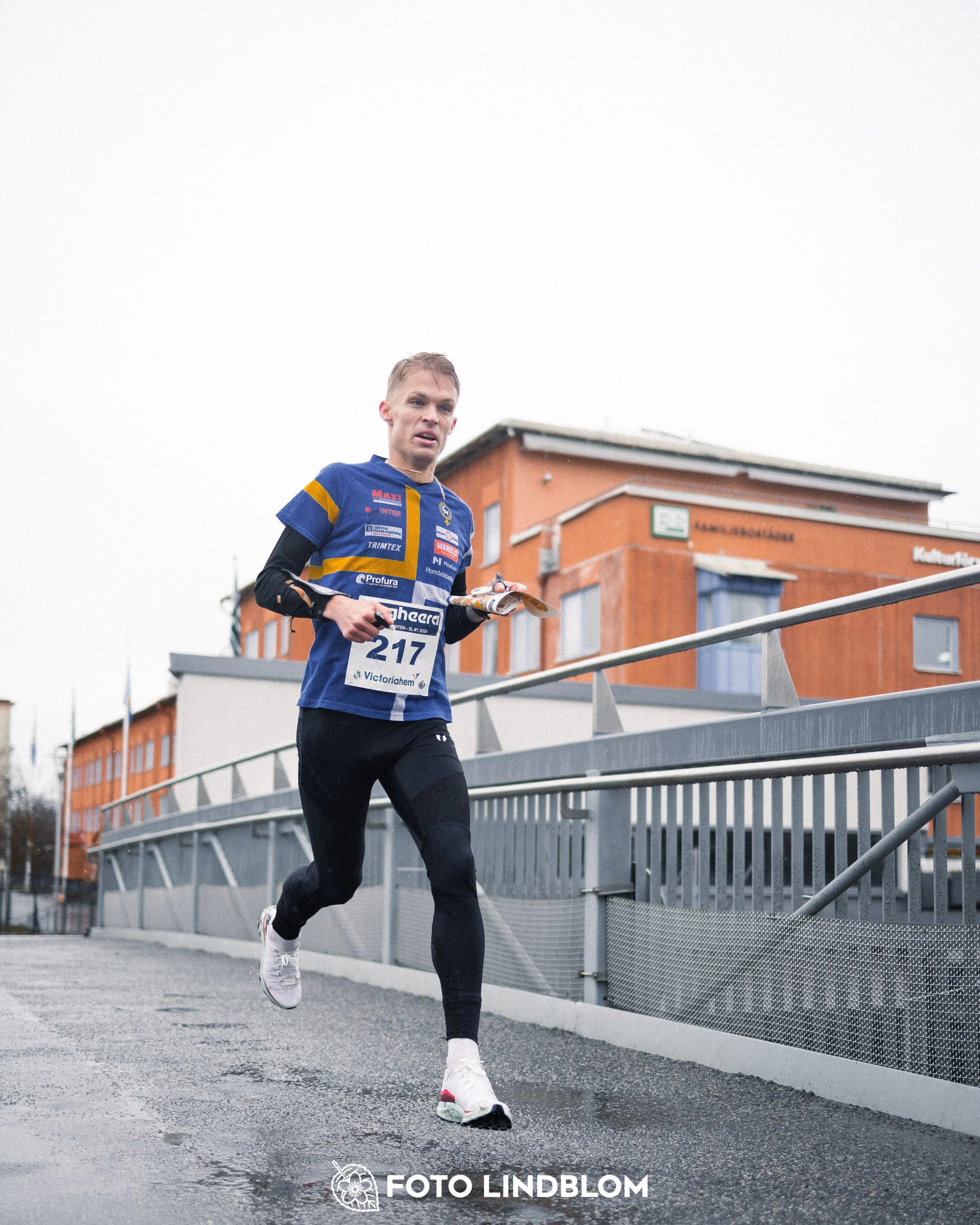 A photo from a Swedish orienteering league race in Stockholm during spring 2026, captured by Foto Lindblom.