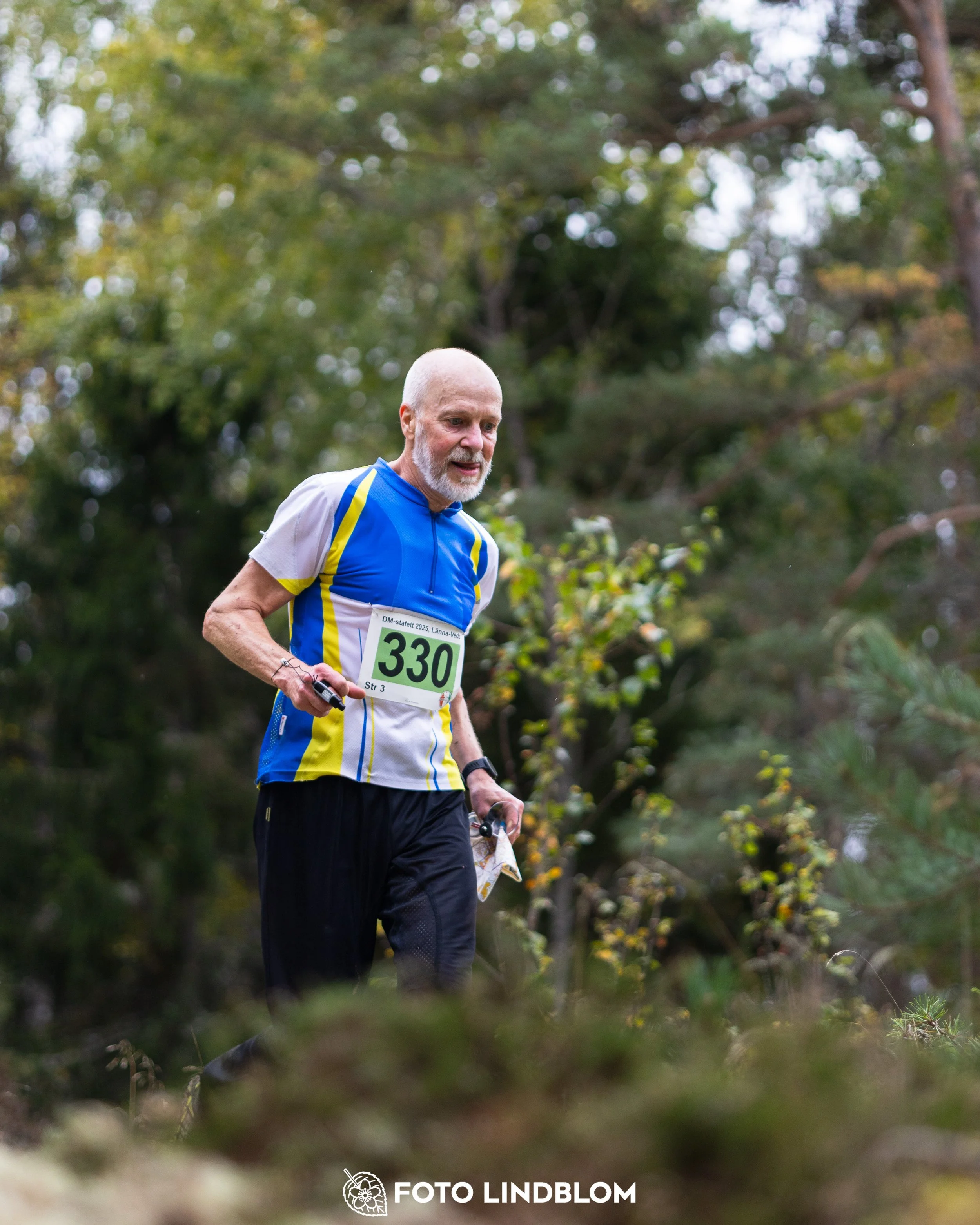 A picture from the Stockholm district championship in relay orienteering taken by Foto Lindblom