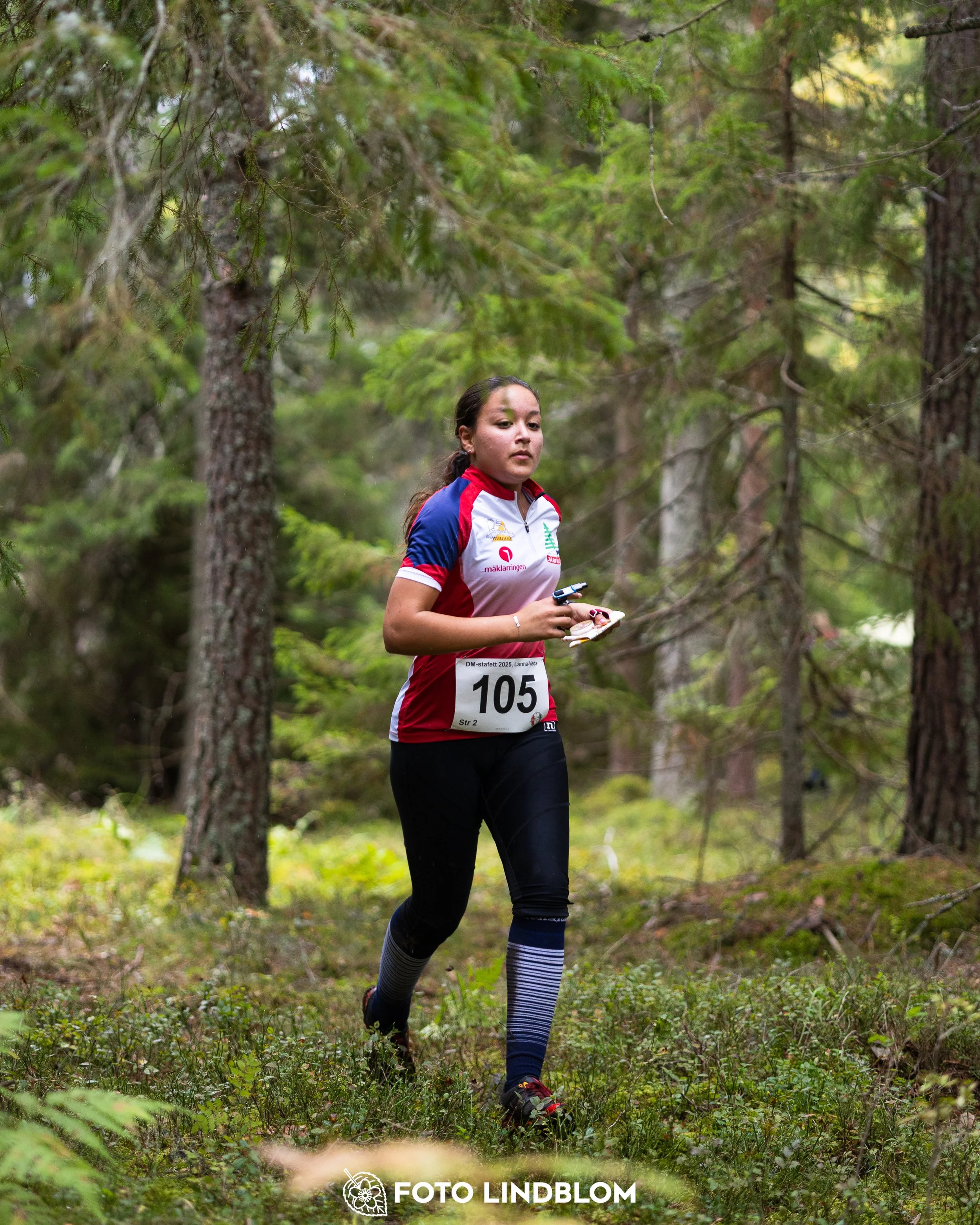 A picture from the Stockholm district championship in relay orienteering taken by Foto Lindblom