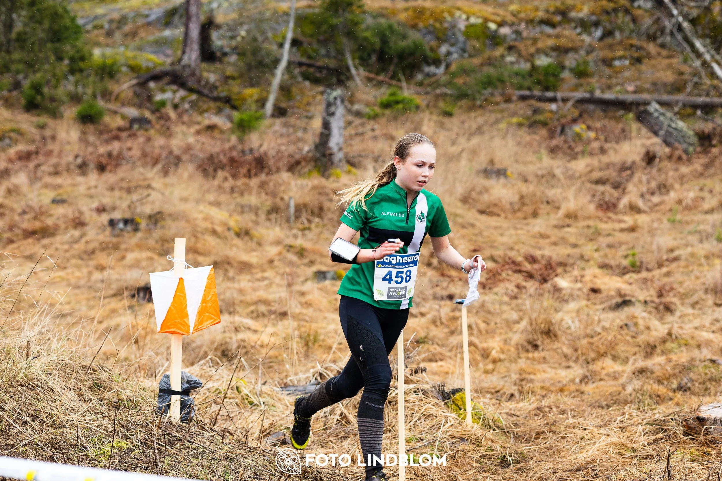 A photo from a forest orienteering competition in Kolmården as part of the Swedish League 2026 season, captured by Foto Lindblom.