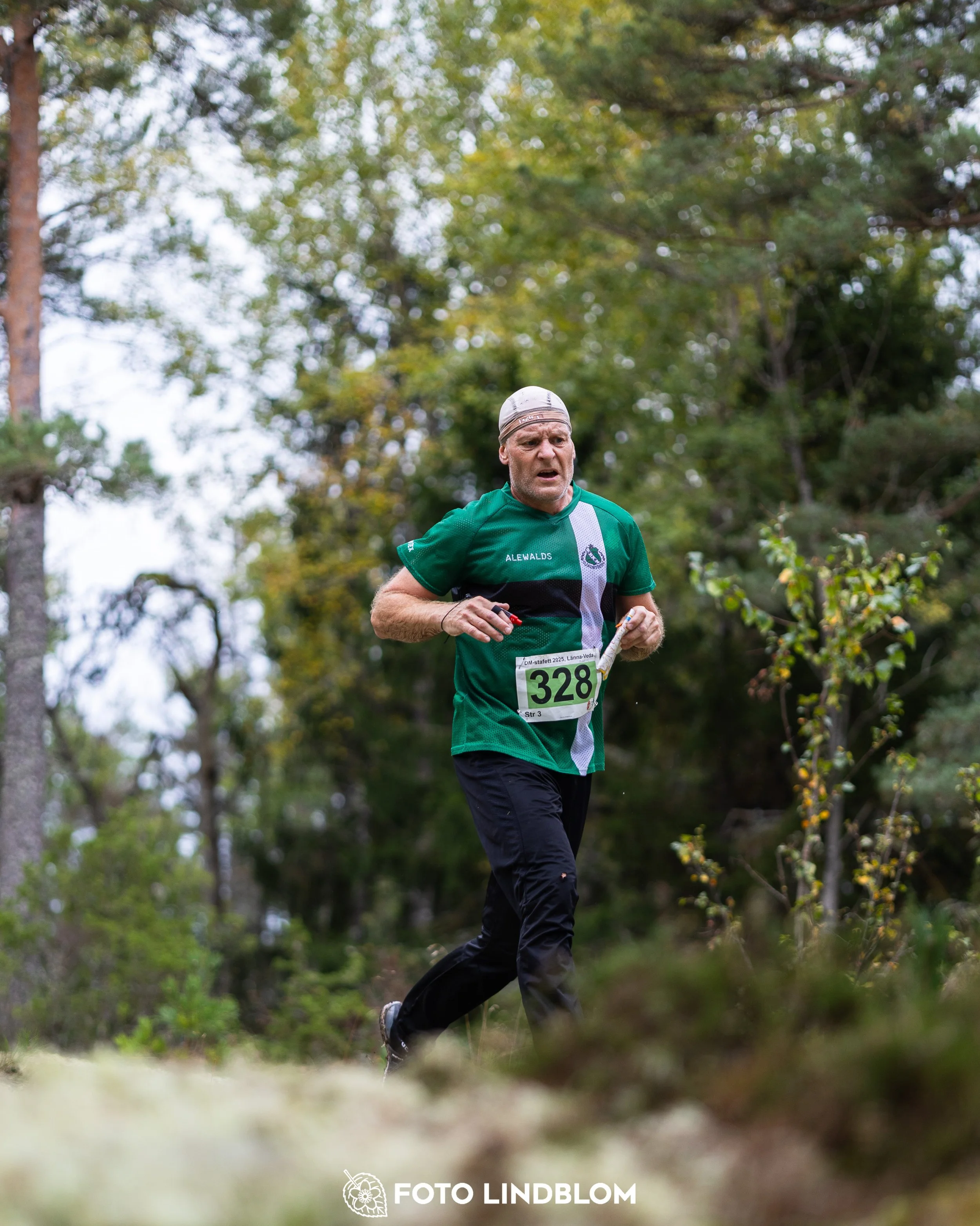 A picture from the Stockholm district championship in relay orienteering taken by Foto Lindblom