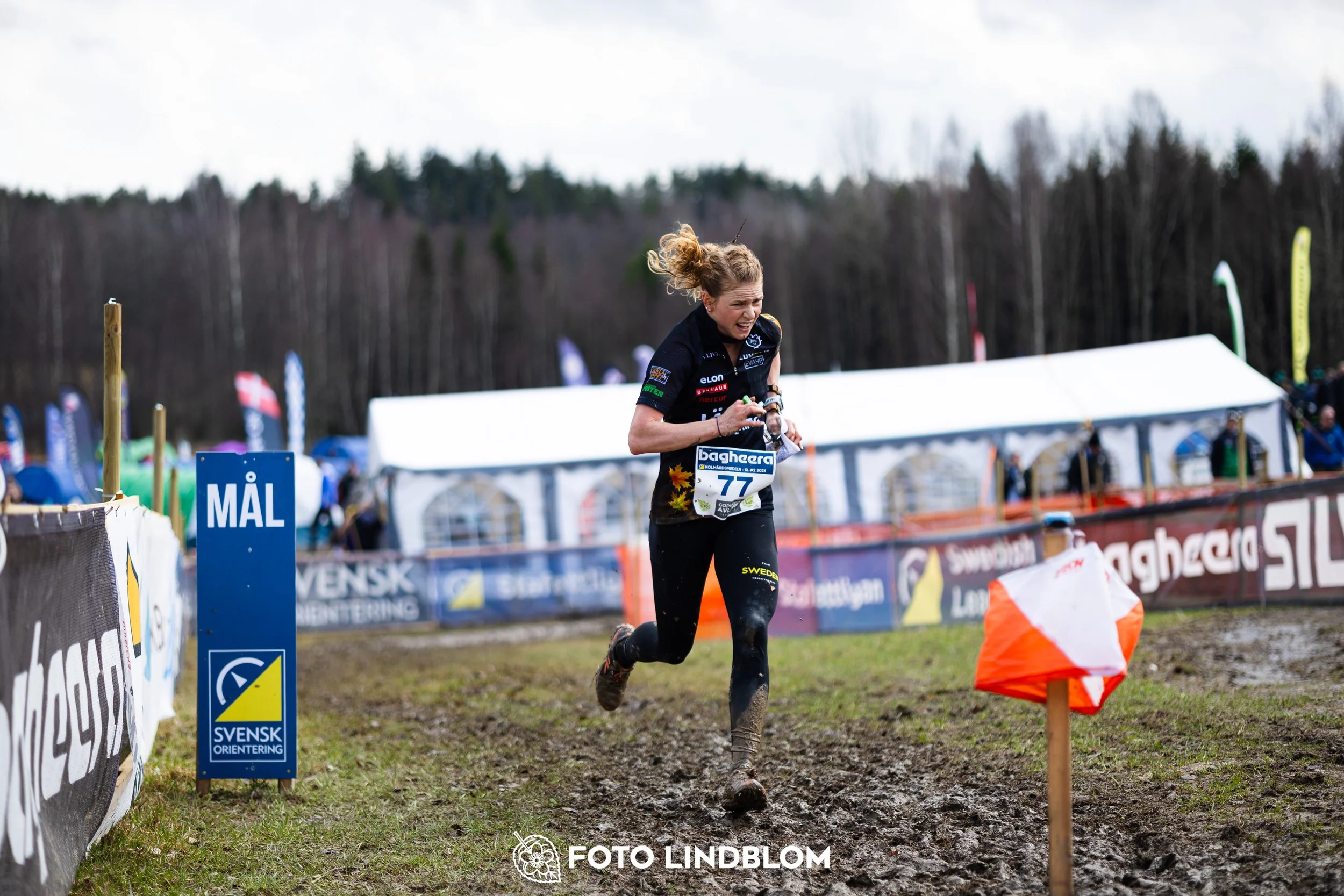 A photo from a Swedish orienteering league race in Kolmården during spring 2026, captured by Foto Lindblom.