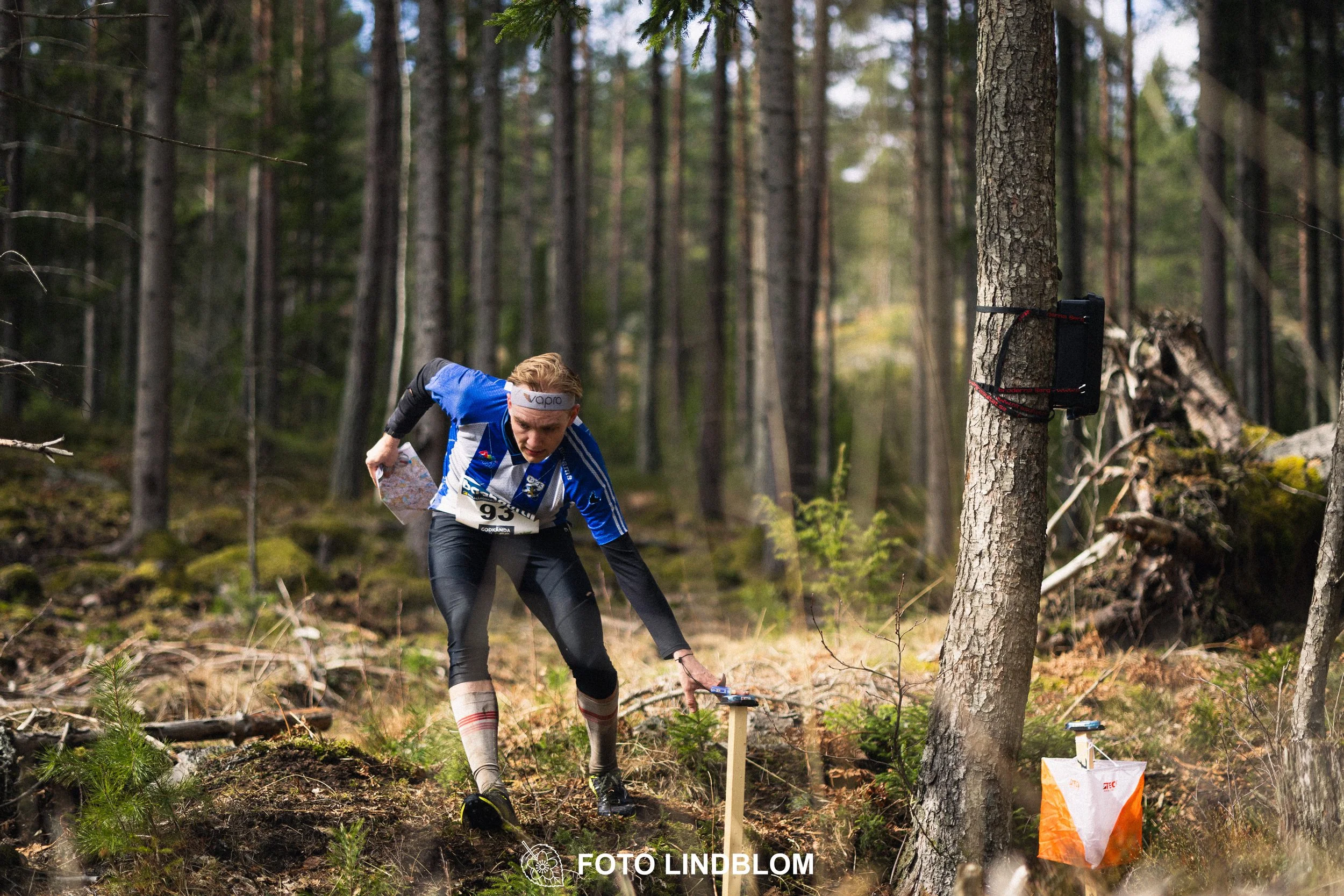 A photo from an orienteering relay race in Kolmården during spring 2026, captured by Foto Lindblom.