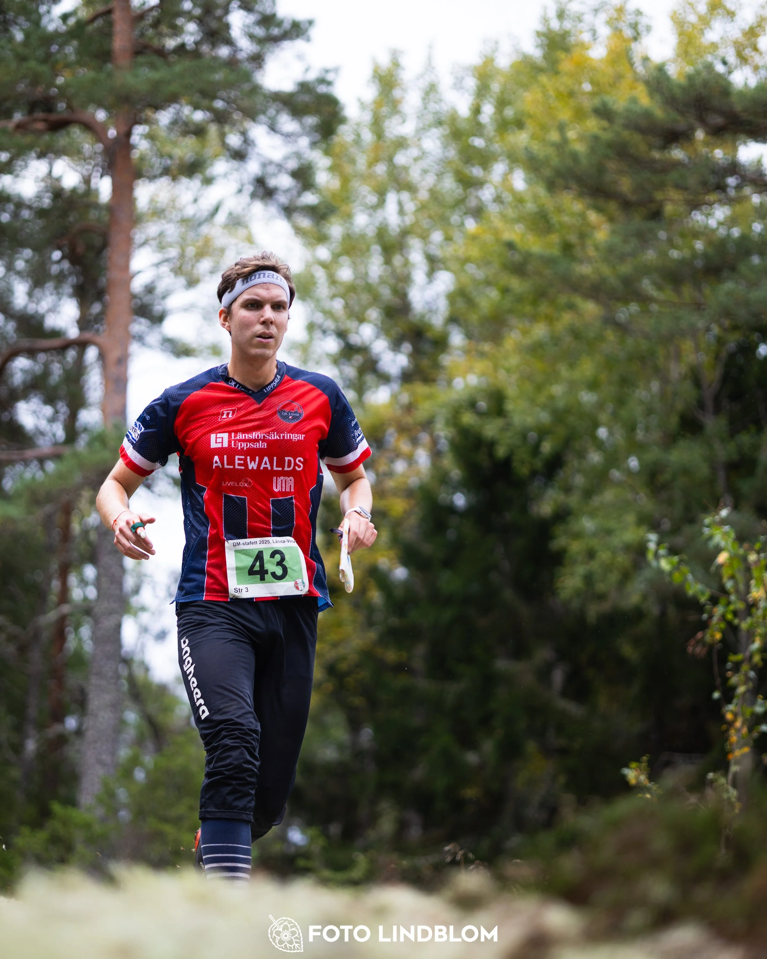 A picture from the Stockholm district championship in relay orienteering taken by Foto Lindblom