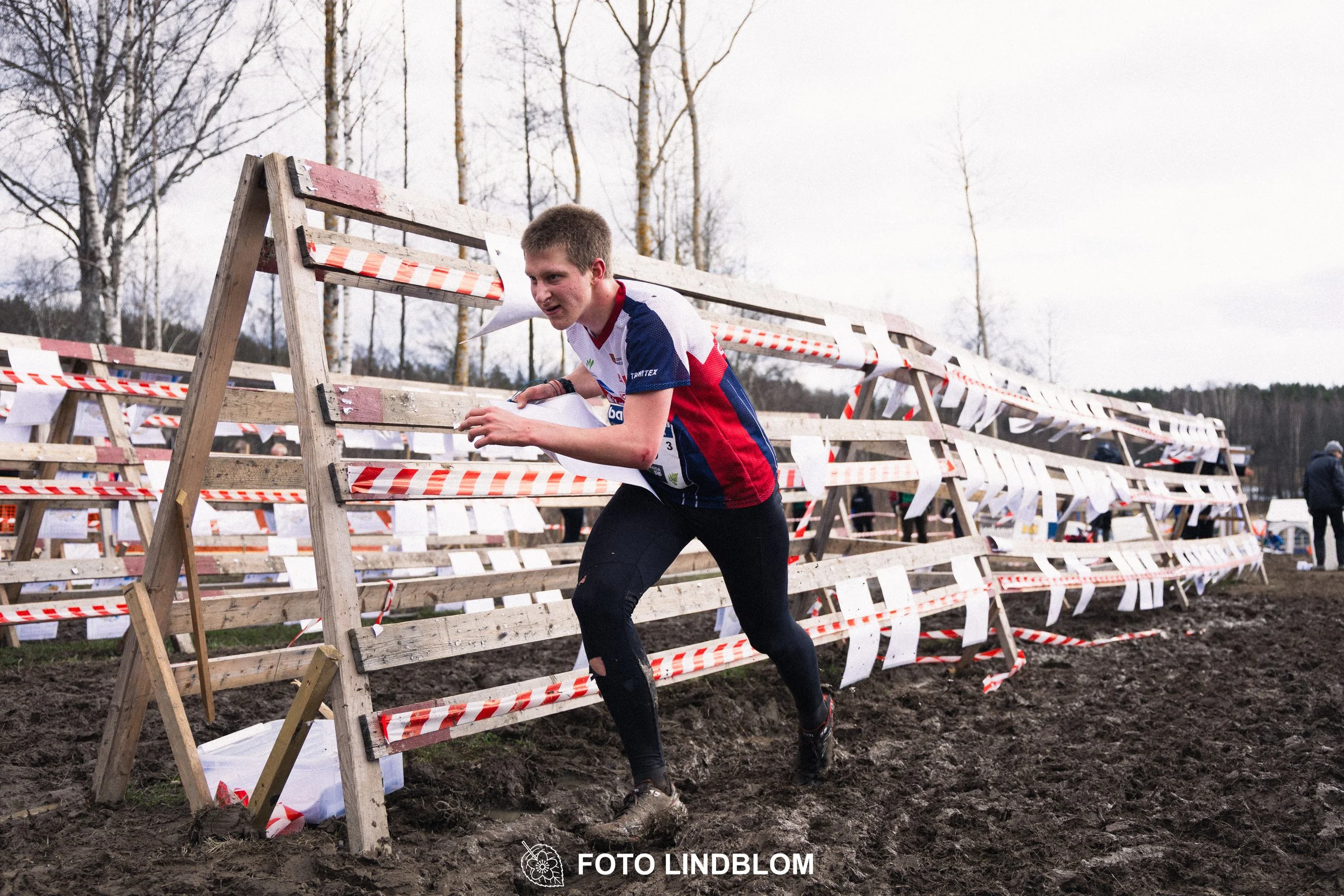 A photo from a relay orienteering competition in Kolmården during the 2026 Stafettligan season, captured by Foto Lindblom.