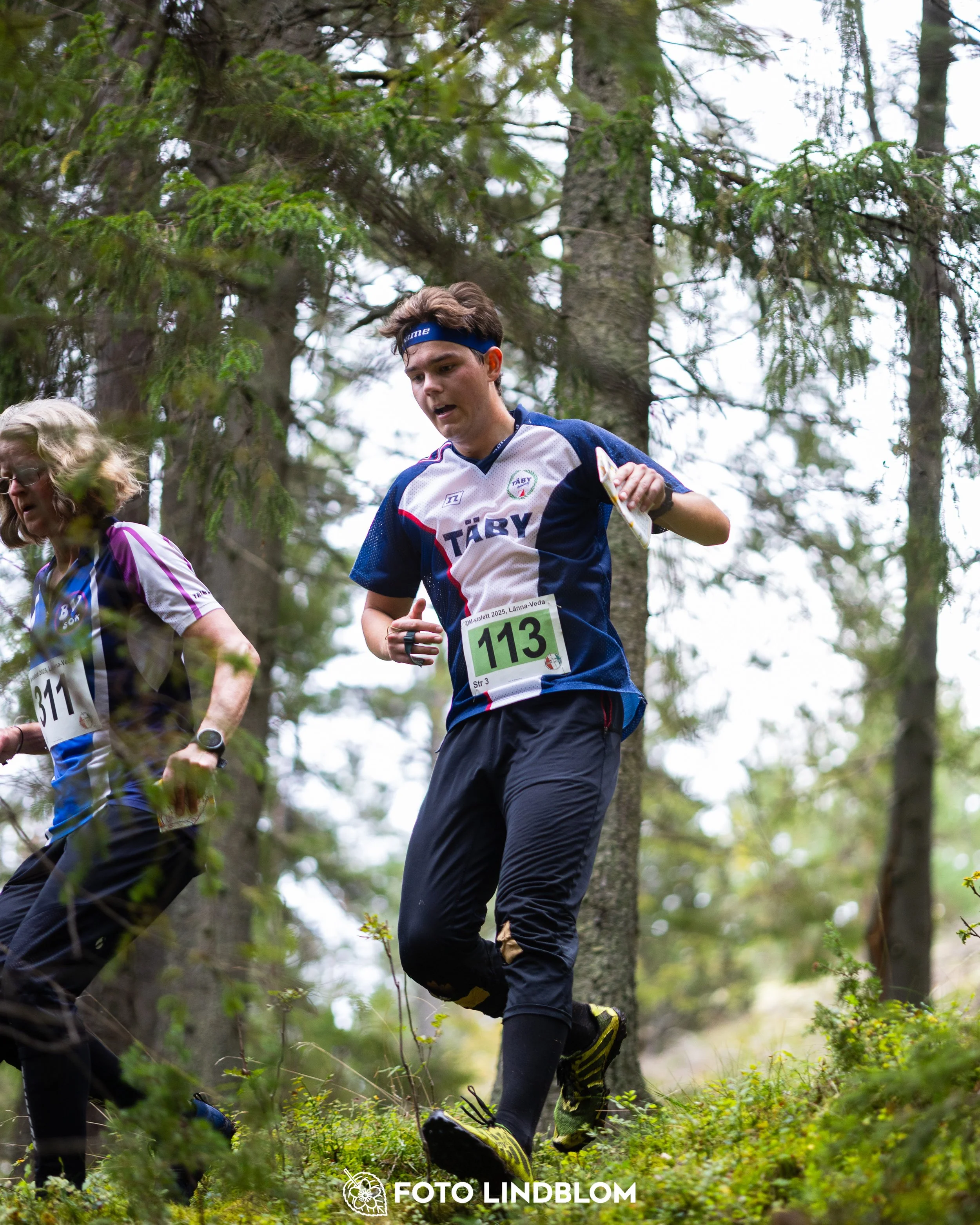 A picture from the Stockholm district championship in relay orienteering taken by Foto Lindblom