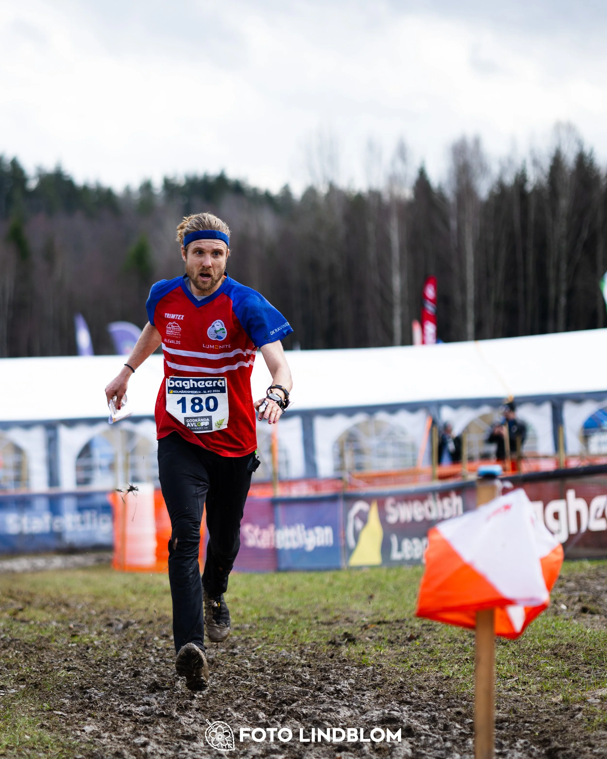 A photo from a middle distance orienteering event in Kolmården during the Swedish League 2026, showing Gustav Bergman, captured by Foto Lindblom.