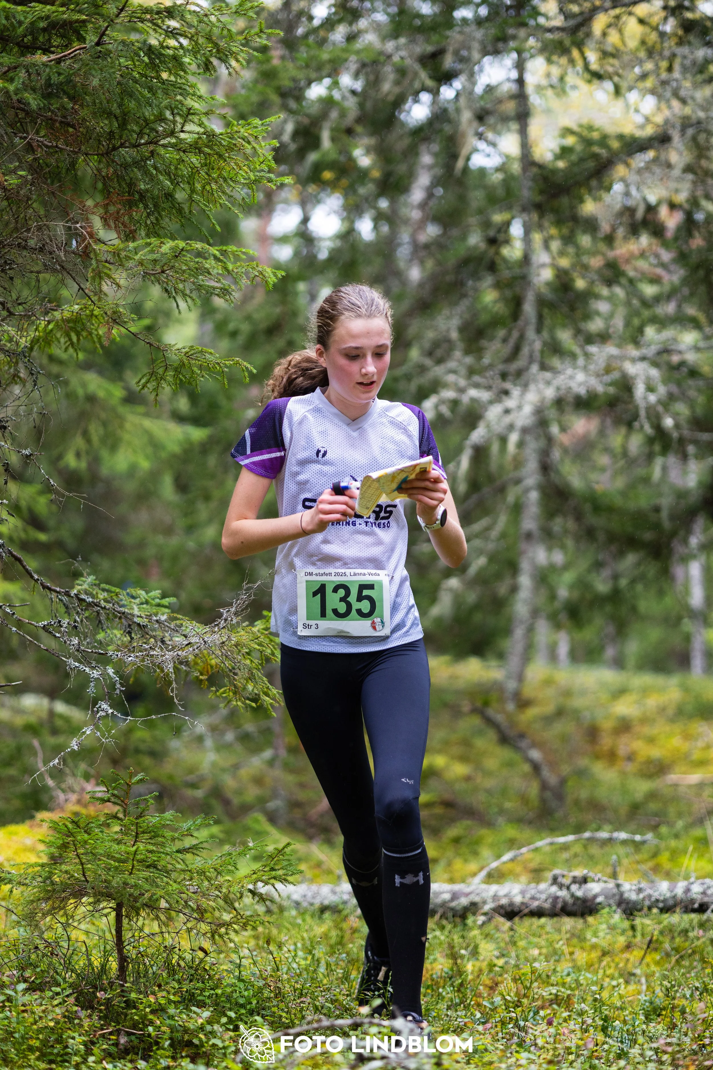 A picture from the Stockholm district championship in relay orienteering taken by Foto Lindblom