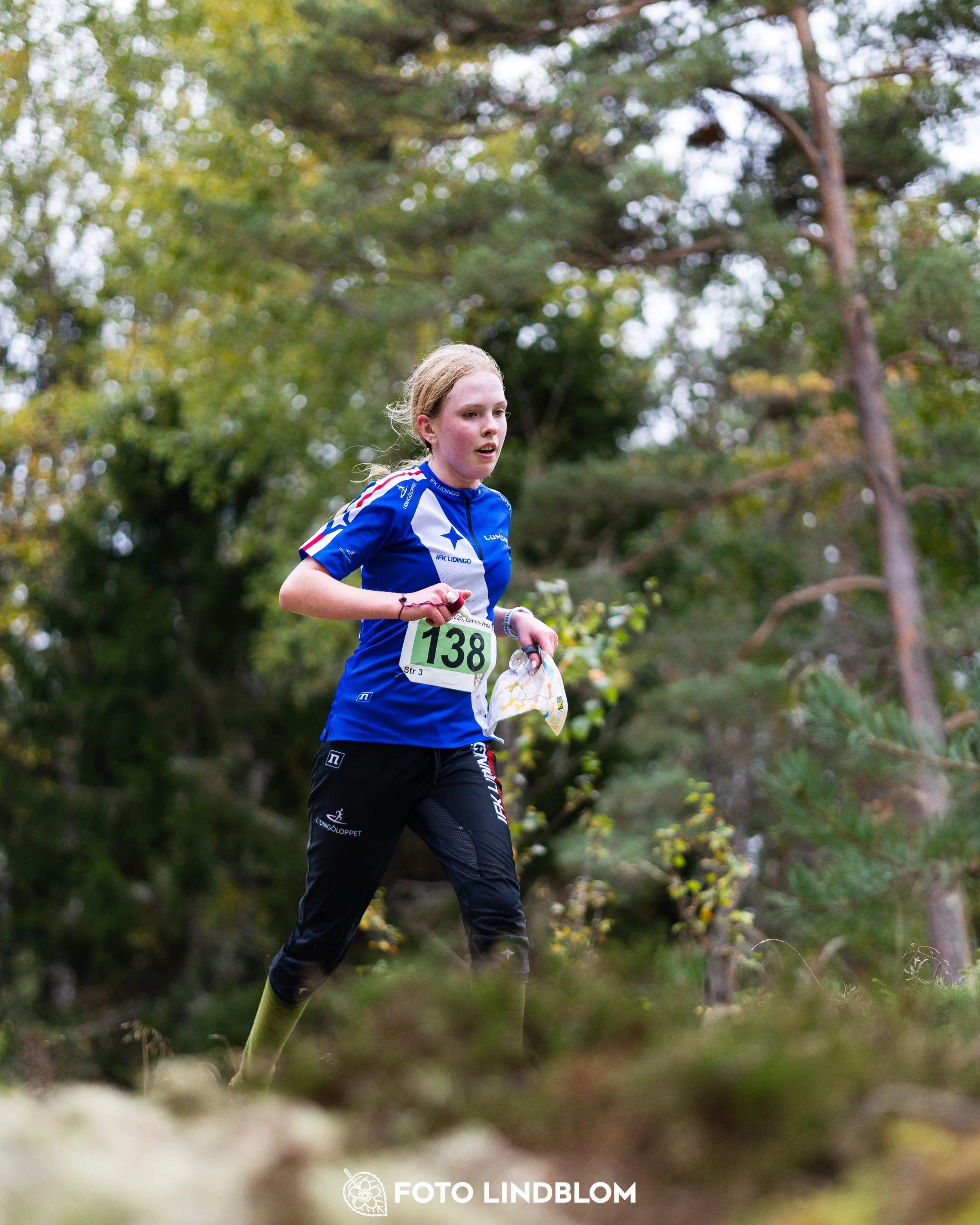 A picture from the Stockholm district championship in relay orienteering taken by Foto Lindblom