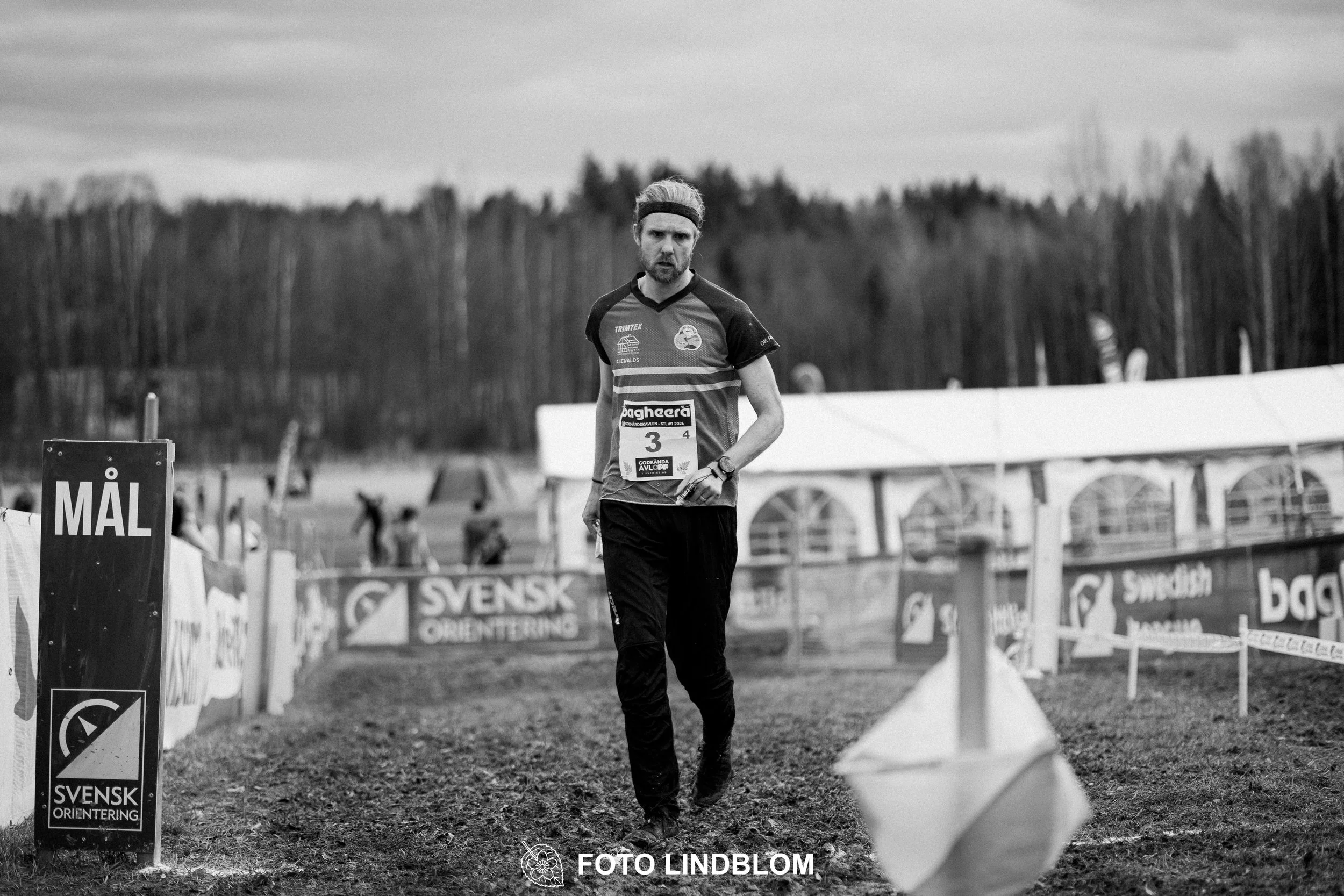 A photo from a relay race in Kolmården during the Swedish orienteering season 2026, showing Gustav Bergman, captured by Foto Lindblom.