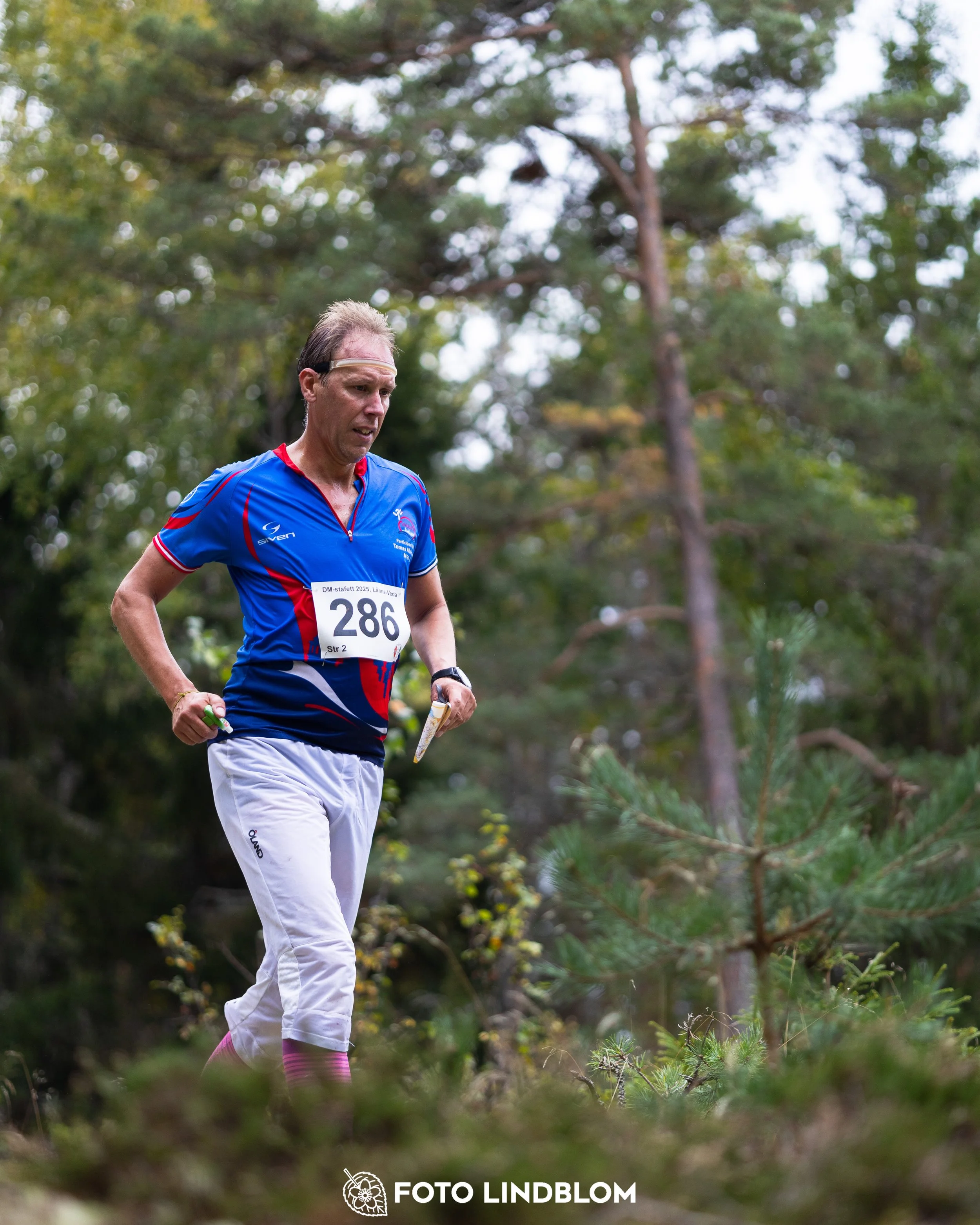 A picture from the Stockholm district championship in relay orienteering taken by Foto Lindblom