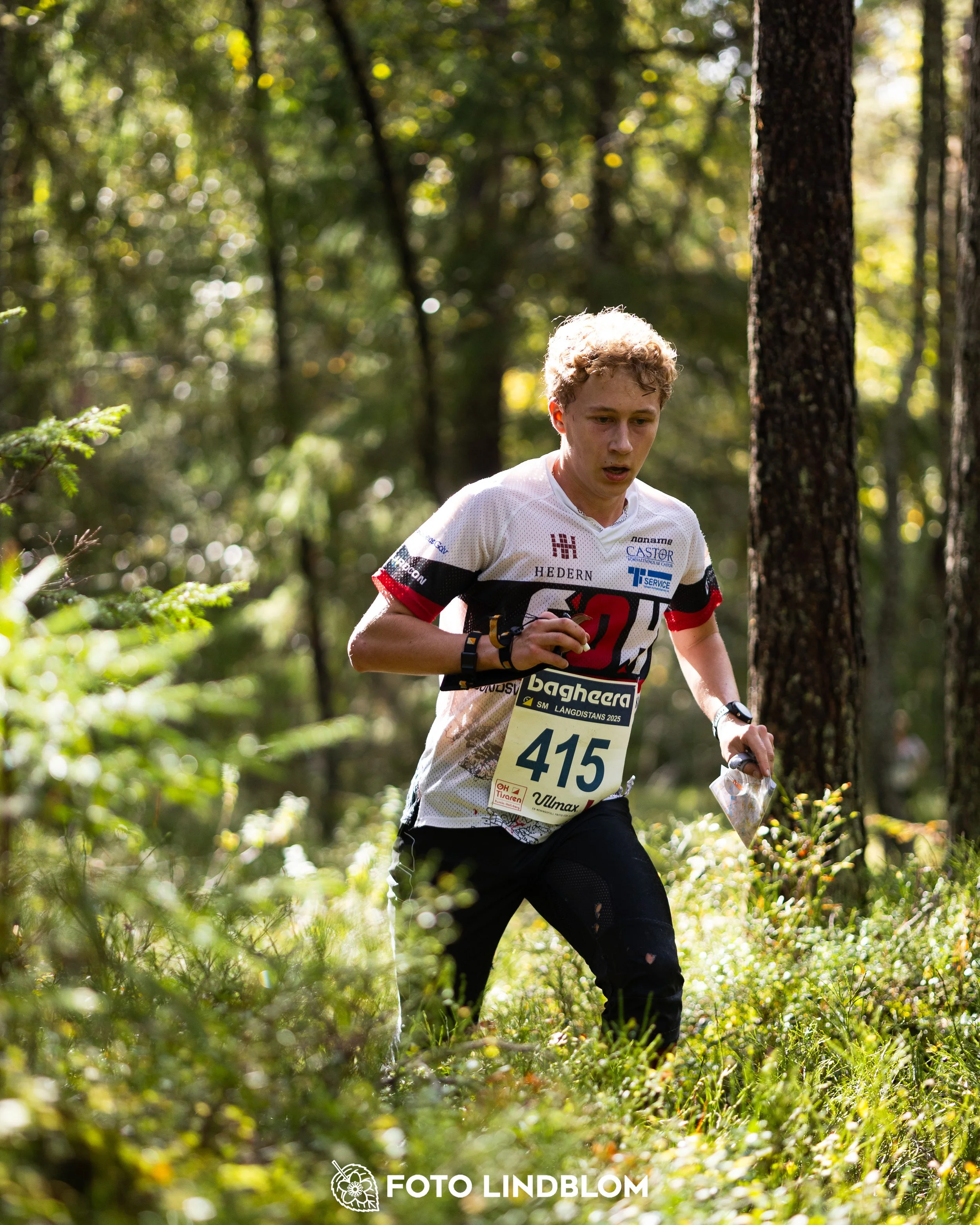 A picture from the Swedish national championship in long distance orienteering and Swedish league race taken by Foto Lindblom