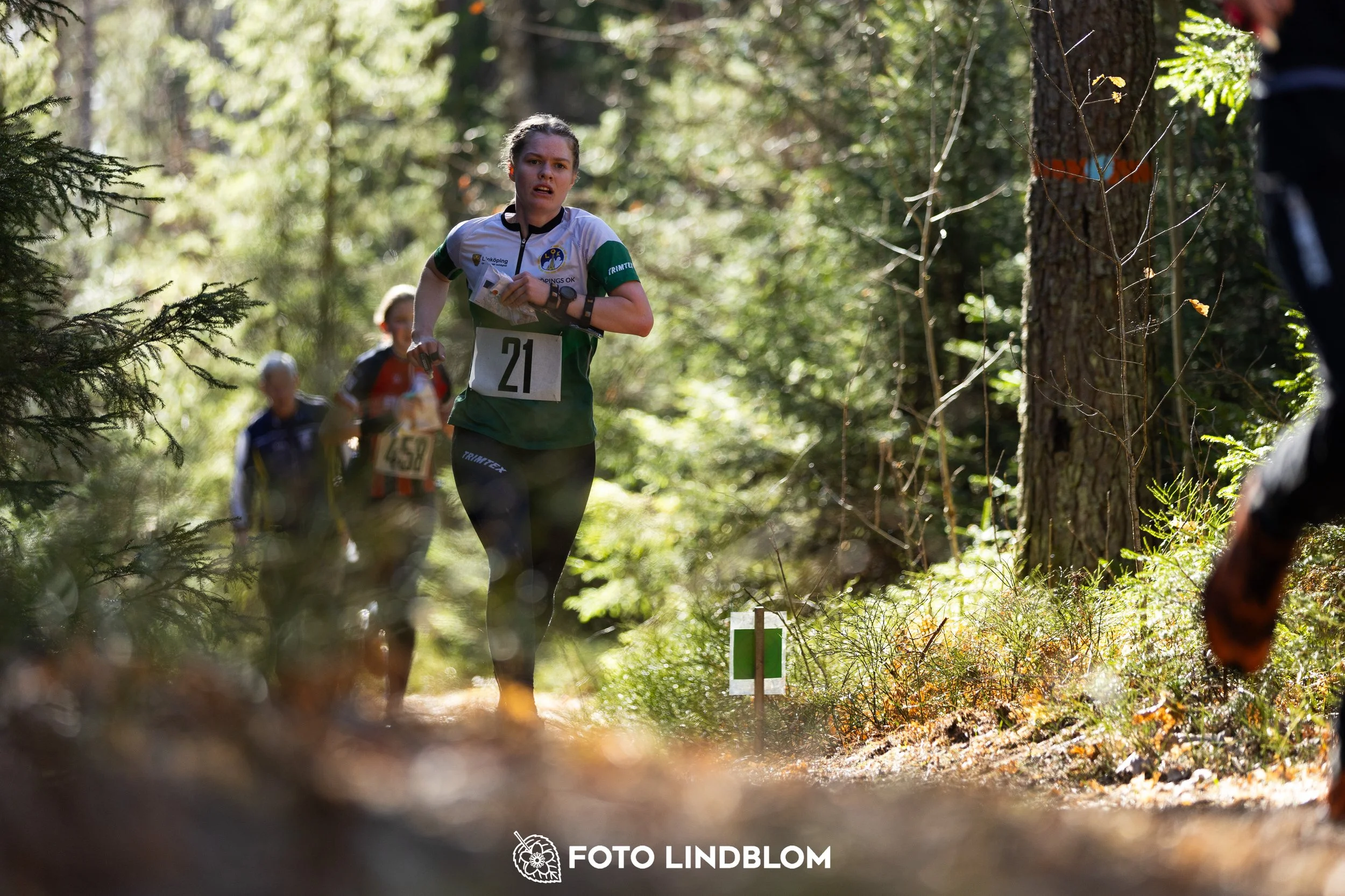 A forest-stage photo from the 2026 Nyköpingsorienteringen orienteering event, taken by Foto Lindblom.