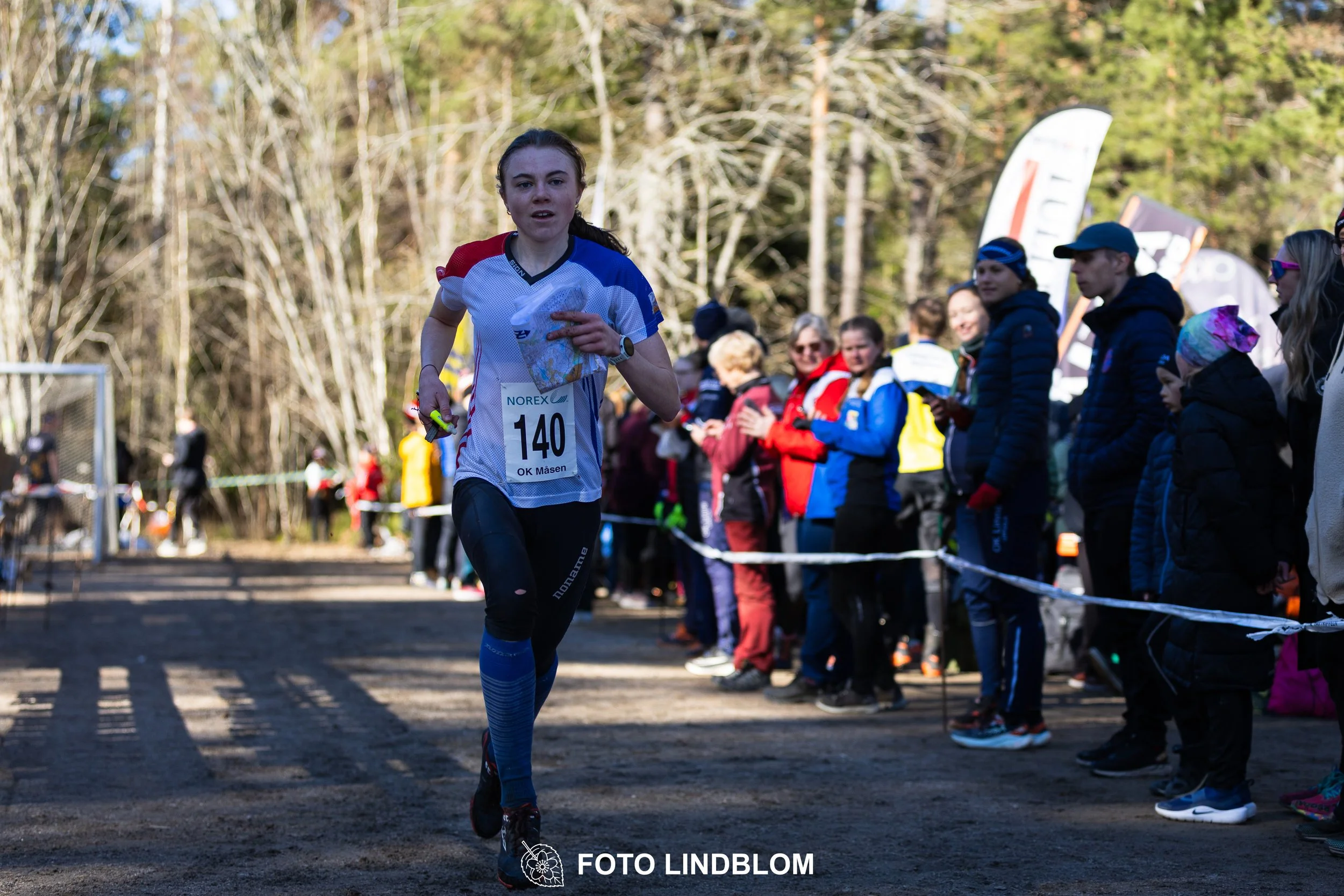 A photo from the 2026 Måsenstafetten orienteering relay in Sweden, showing Freja Hjerne, captured by Foto Lindblom.