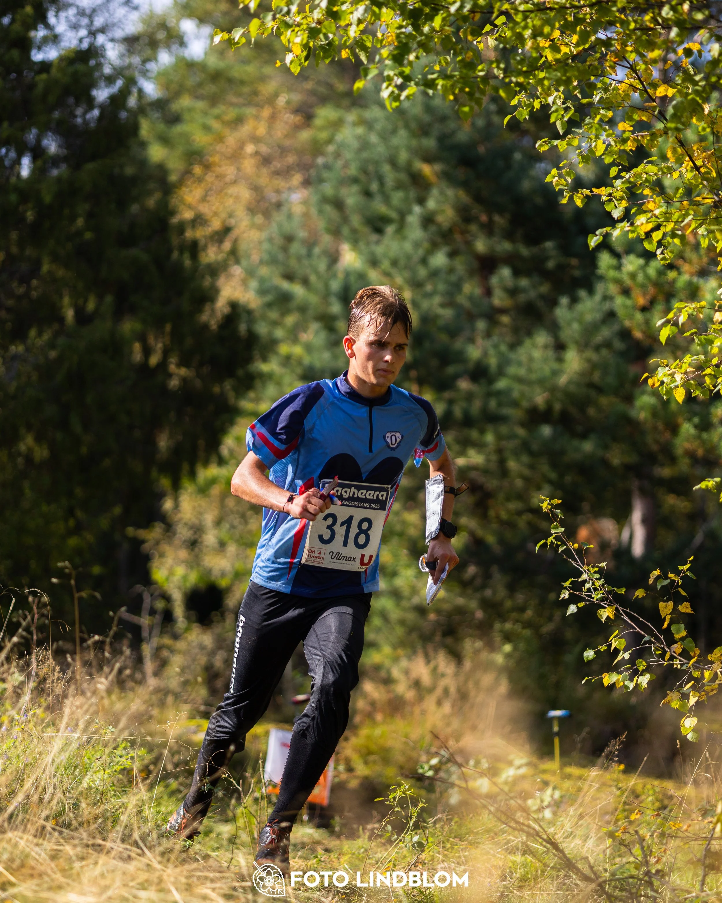 A picture from the Swedish national championship in long distance orienteering and Swedish league race taken by Foto Lindblom
