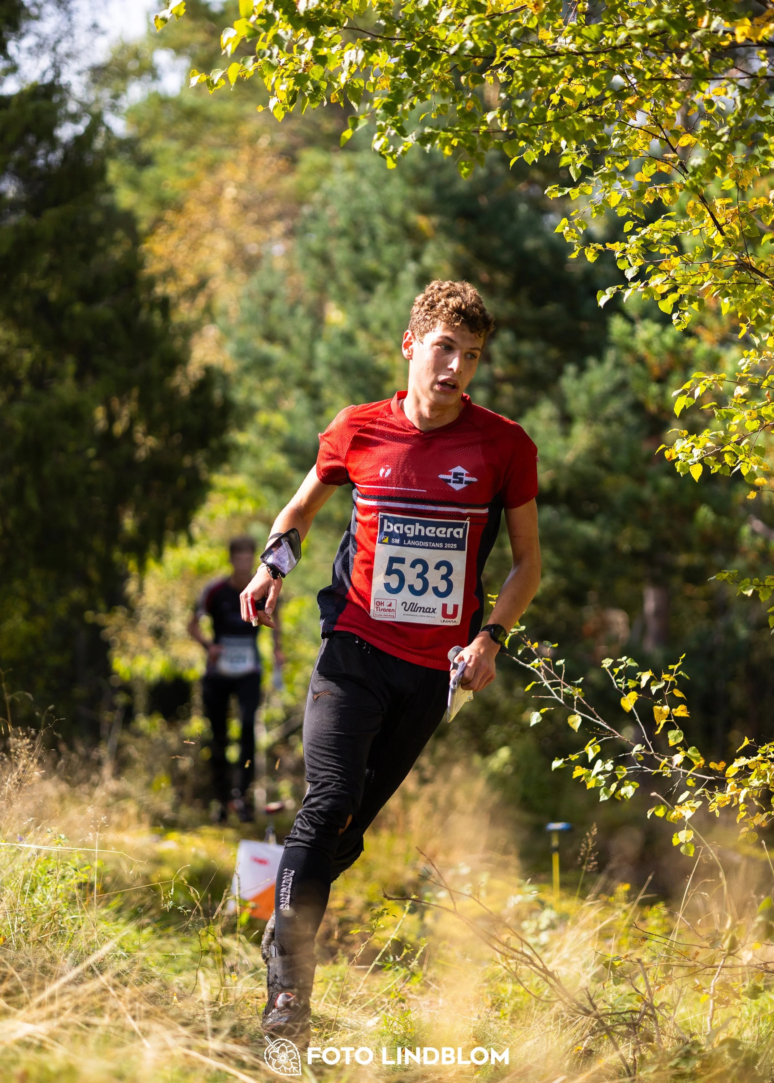 A picture from the Swedish national championship in long distance orienteering and Swedish league race taken by Foto Lindblom