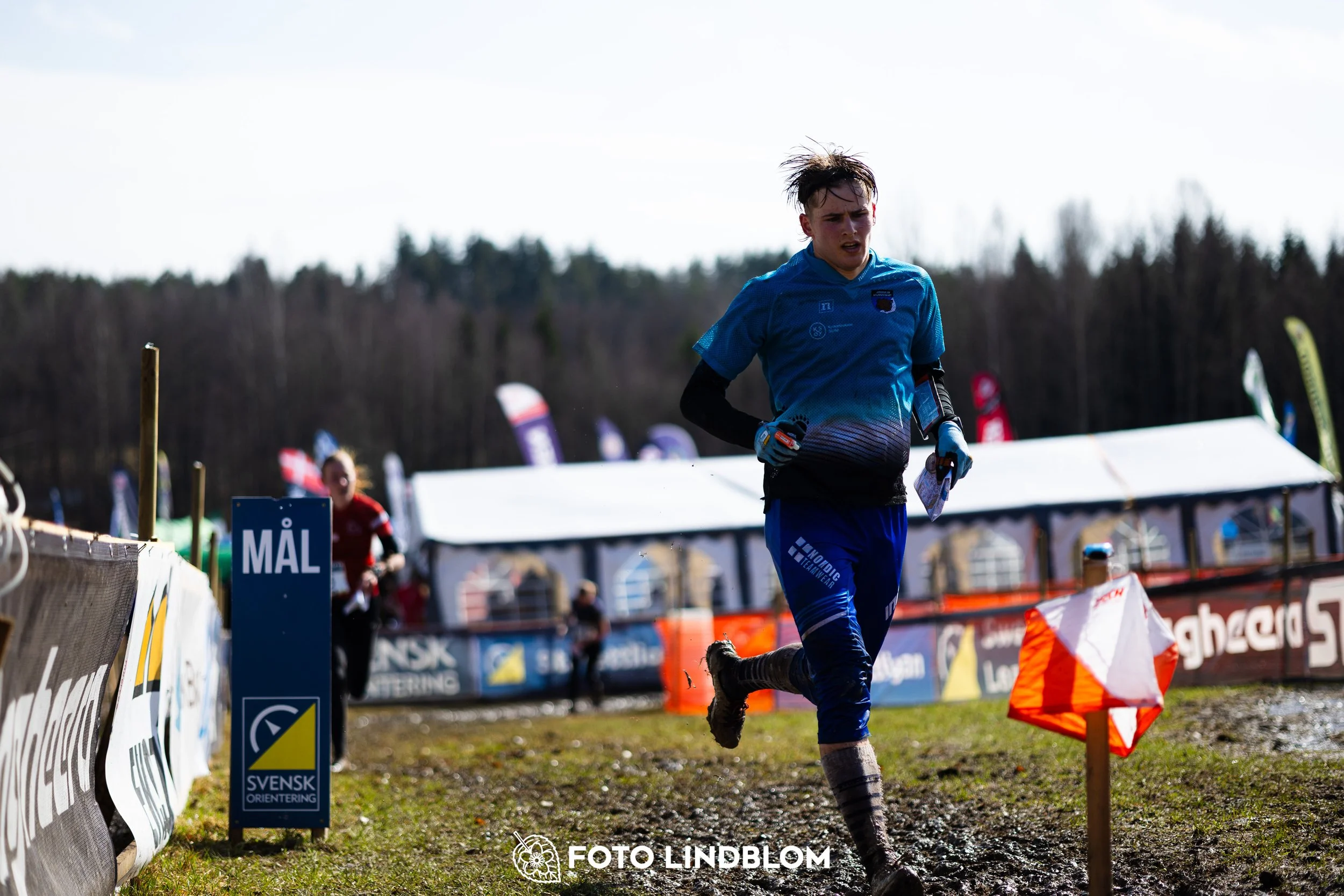 A photo from a forest orienteering competition in Kolmården as part of the Swedish League 2026 season, captured by Foto Lindblom.