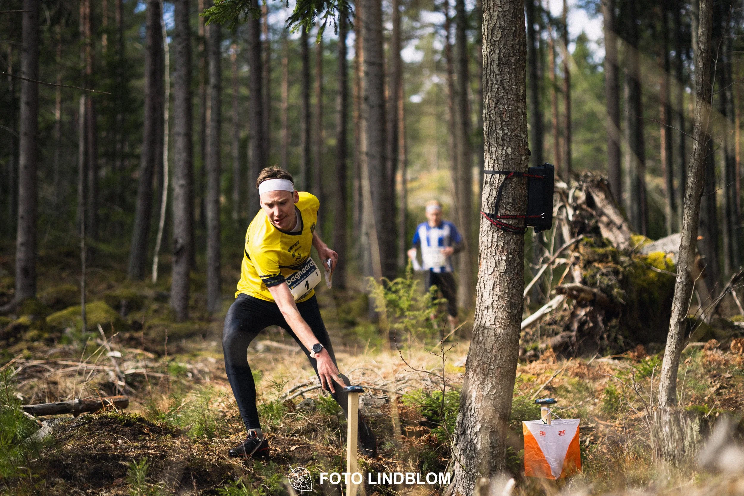 A moment captured during Kolmårdskavlen in the Swedish Stafettligan 2026, showing Emil Svensk, by Foto Lindblom.