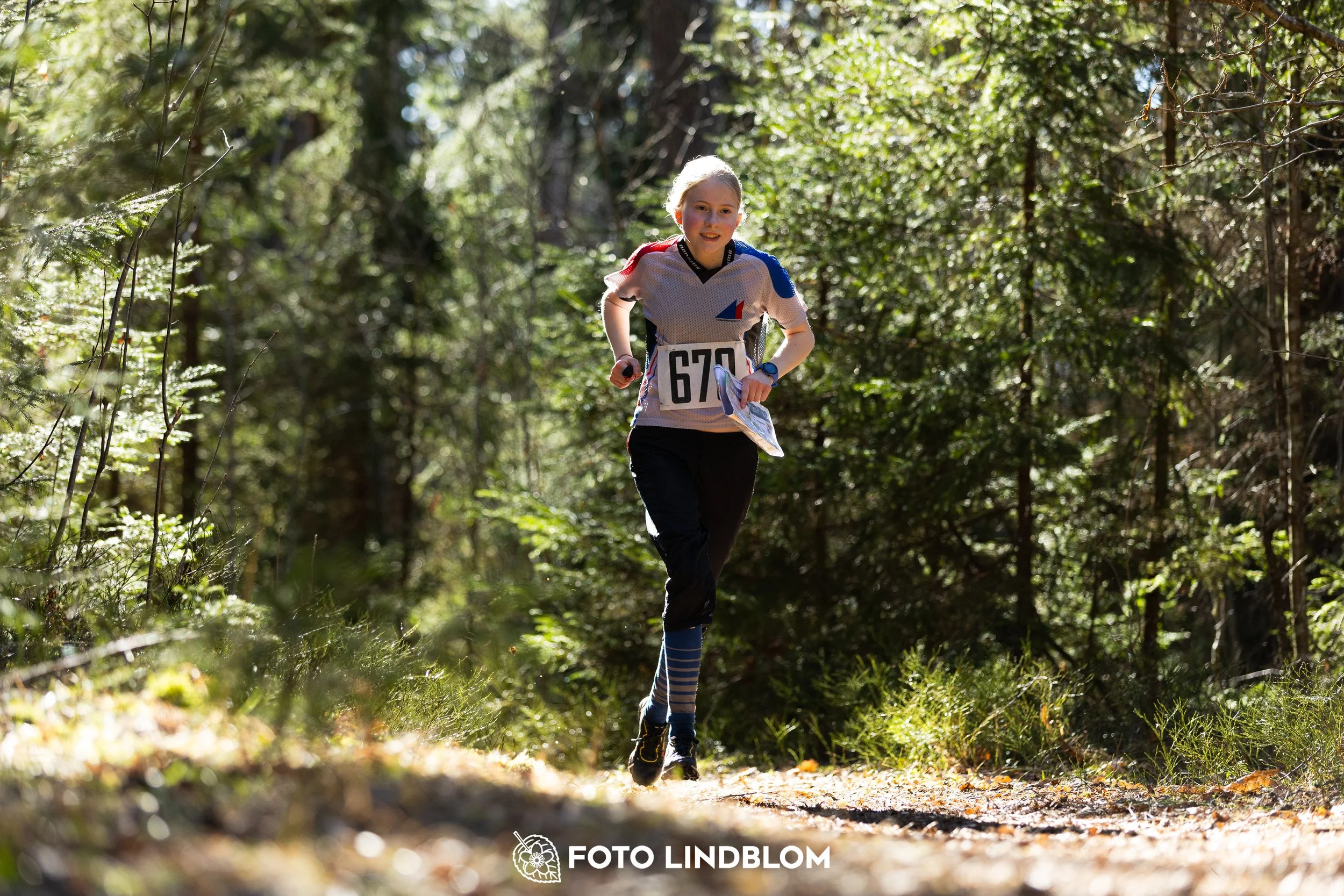 A moment from the 2026 Nyköpingsorienteringen orienteering race in Sweden, captured by Foto Lindblom.