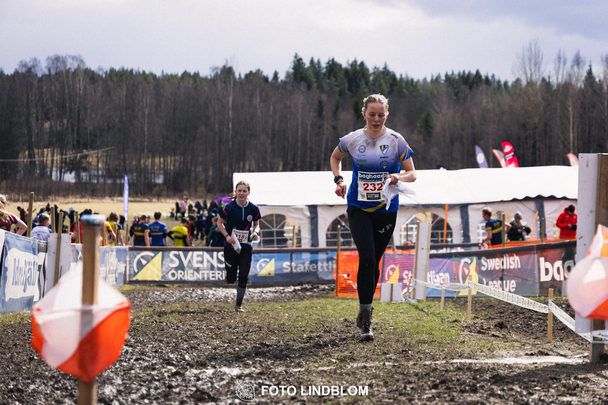 A photo from an orienteering relay race in Kolmården during spring 2026, captured by Foto Lindblom.
