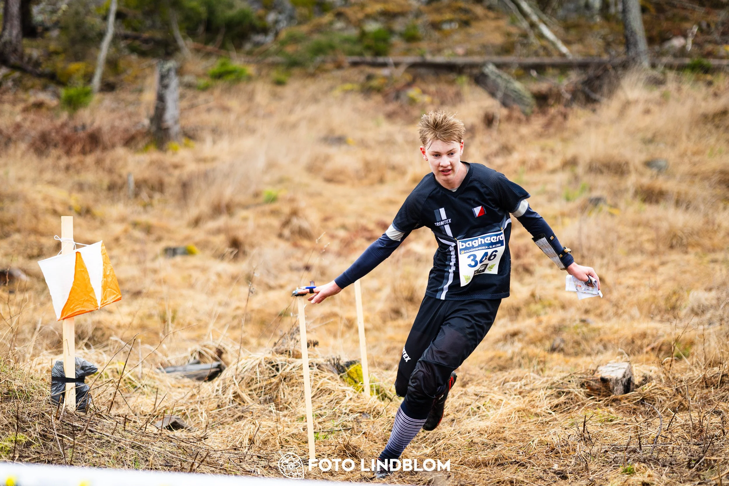 A photo from a forest orienteering competition in Kolmården as part of the Swedish League 2026 season, captured by Foto Lindblom.