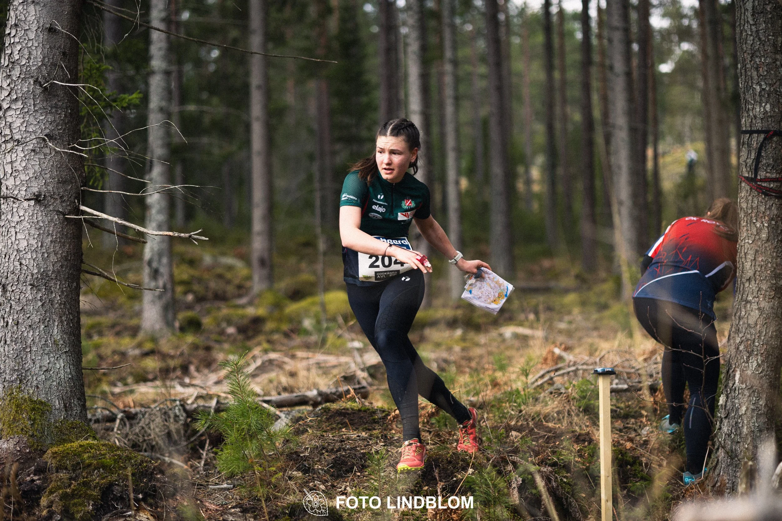 A moment captured during Kolmårdskavlen in the Swedish Stafettligan 2026 by Foto Lindblom.
