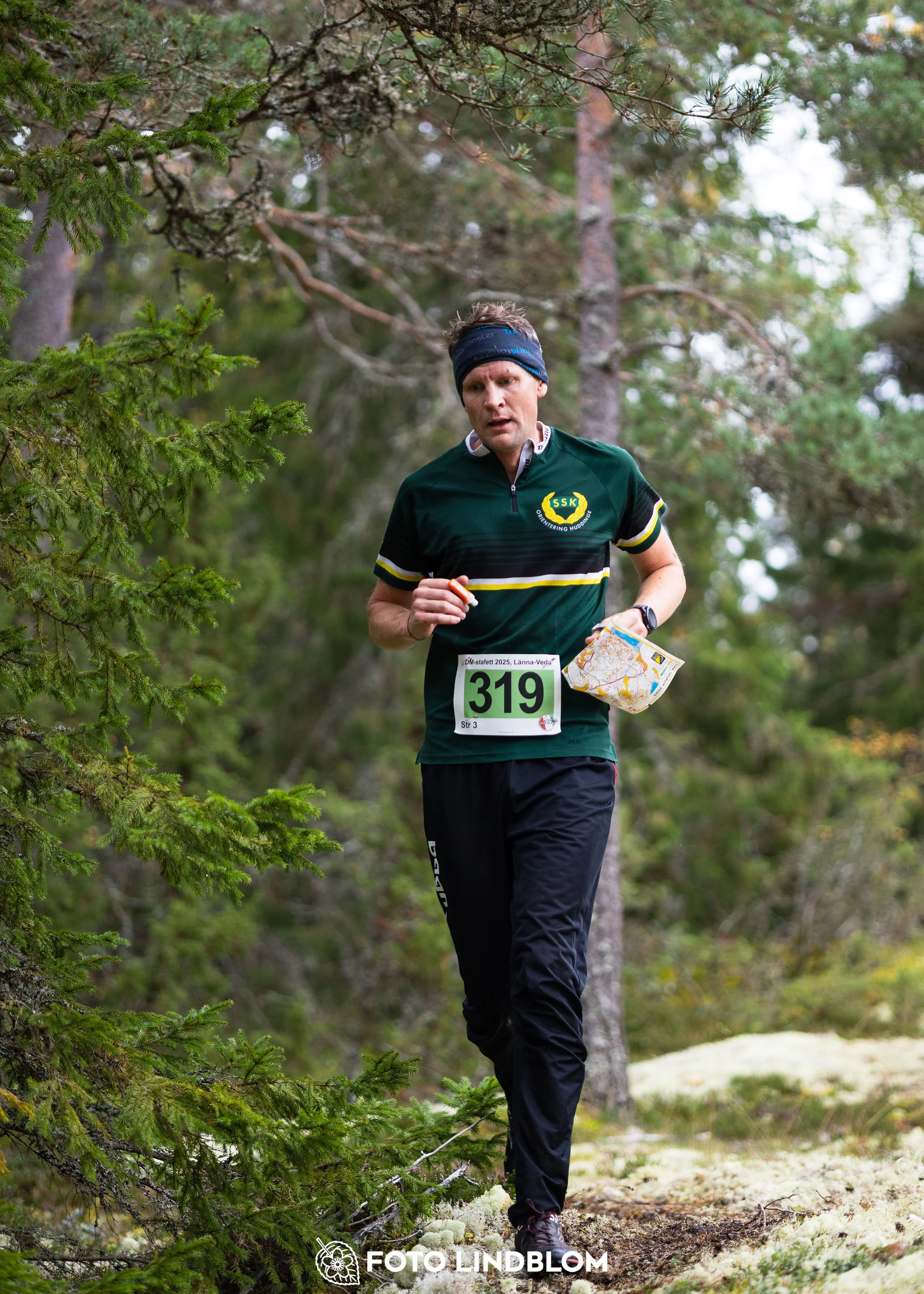 A picture from the Stockholm district championship in relay orienteering taken by Foto Lindblom