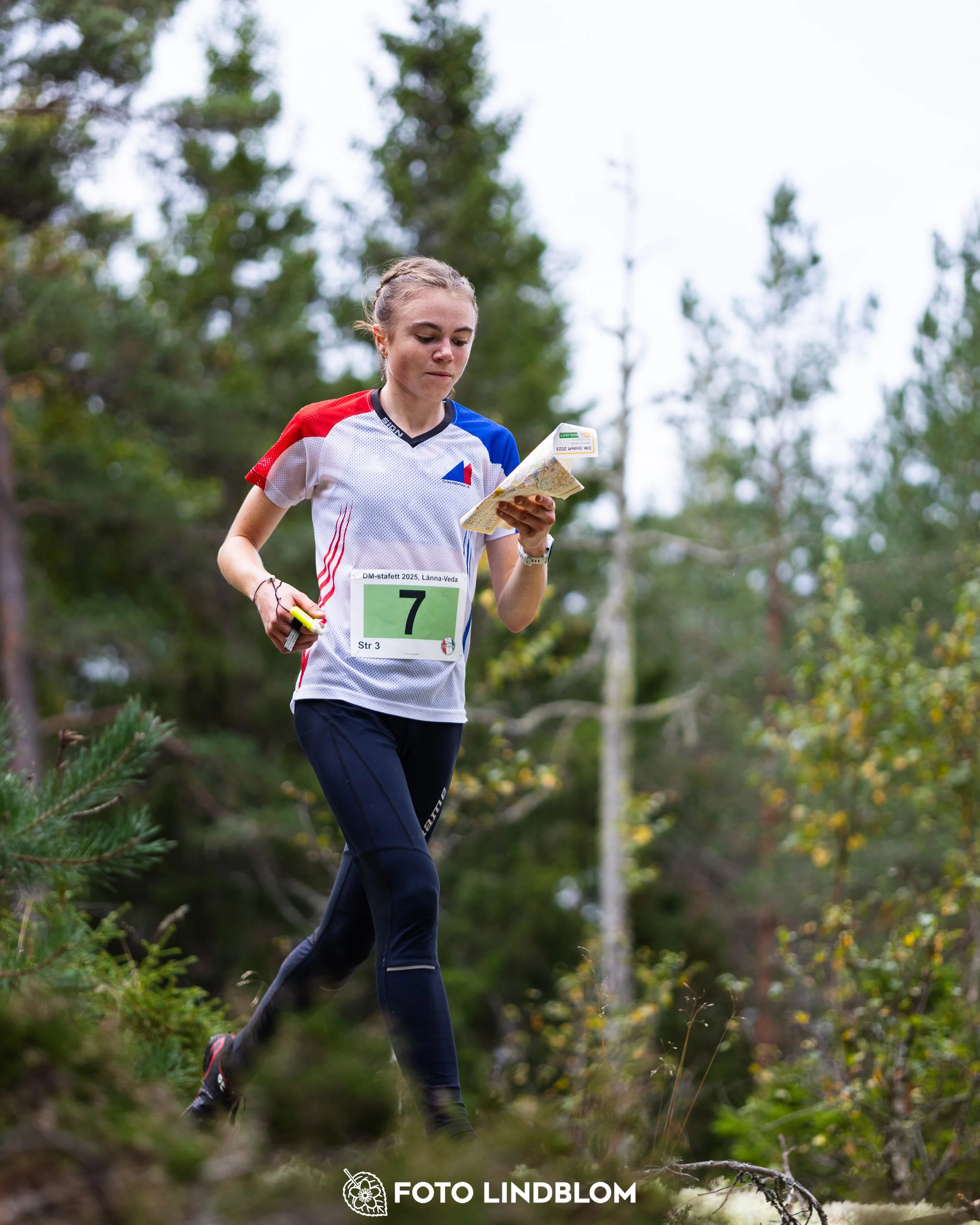 A picture from the Stockholm district championship in relay orienteering taken by Foto Lindblom