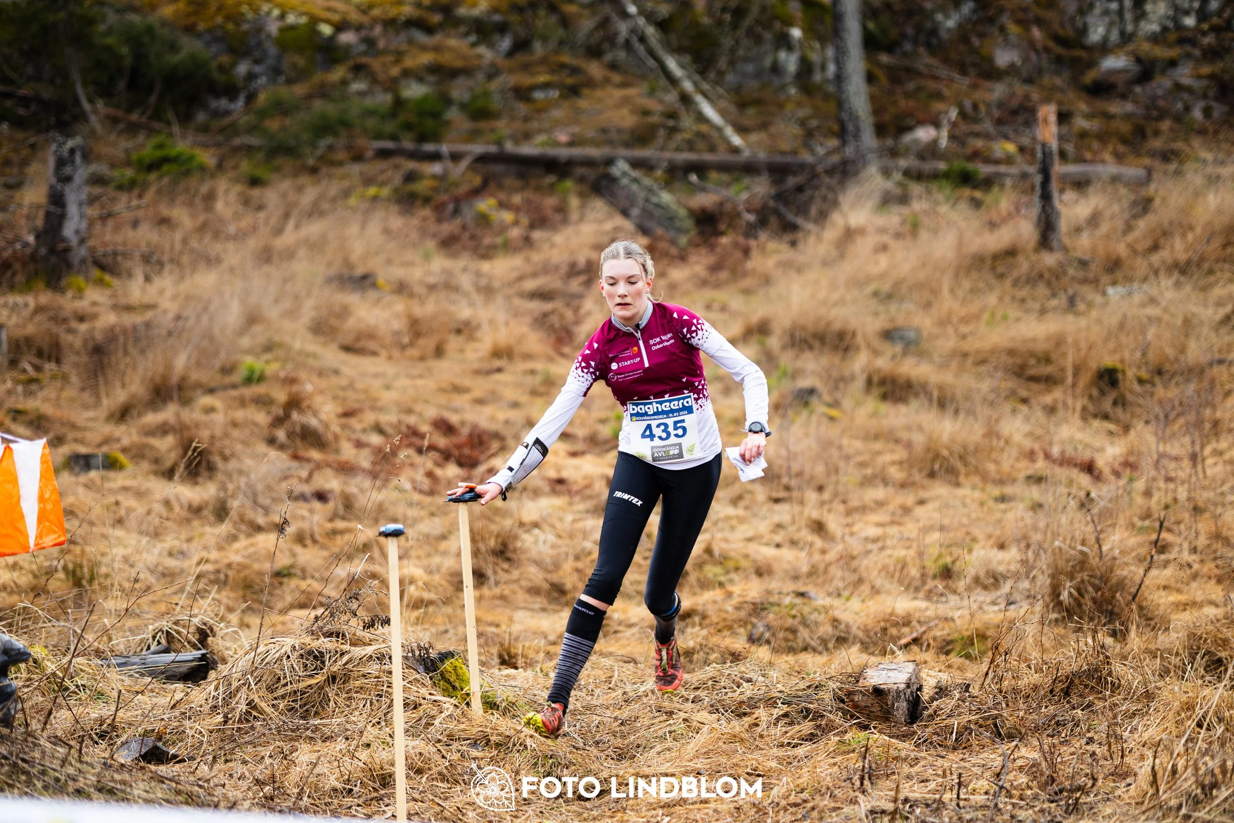 A photo from a Swedish orienteering league race in Kolmården during spring 2026, captured by Foto Lindblom.