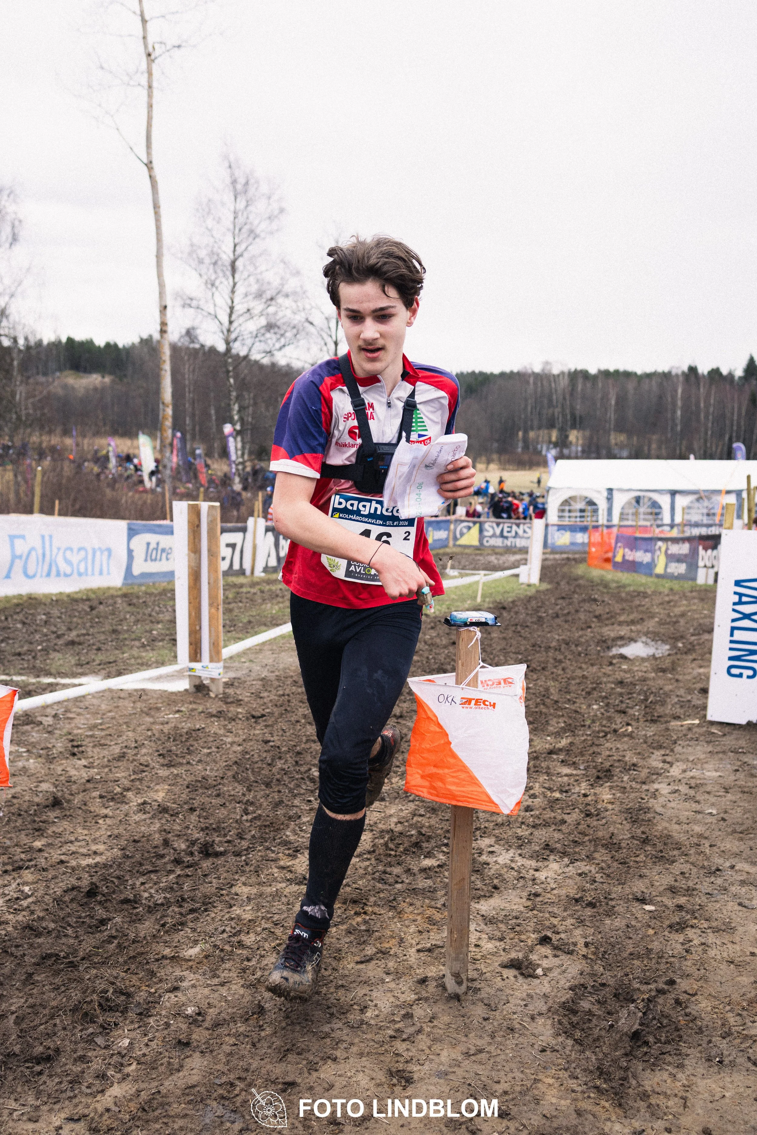 A photo from a relay orienteering competition in Kolmården during the 2026 Stafettligan season, captured by Foto Lindblom.