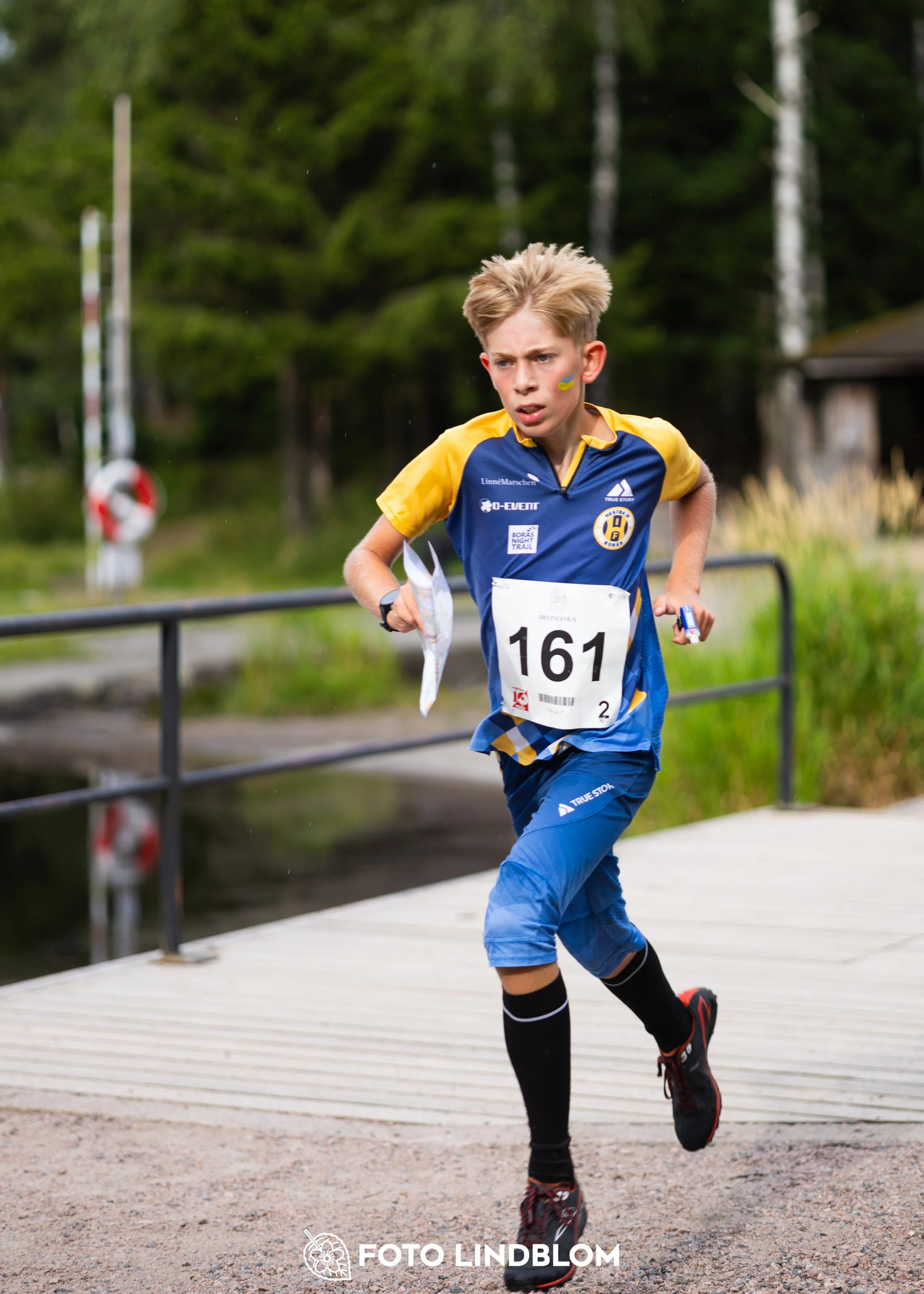 A picture from the youth 10 mila orienteering competition taken by Foto Lindblom