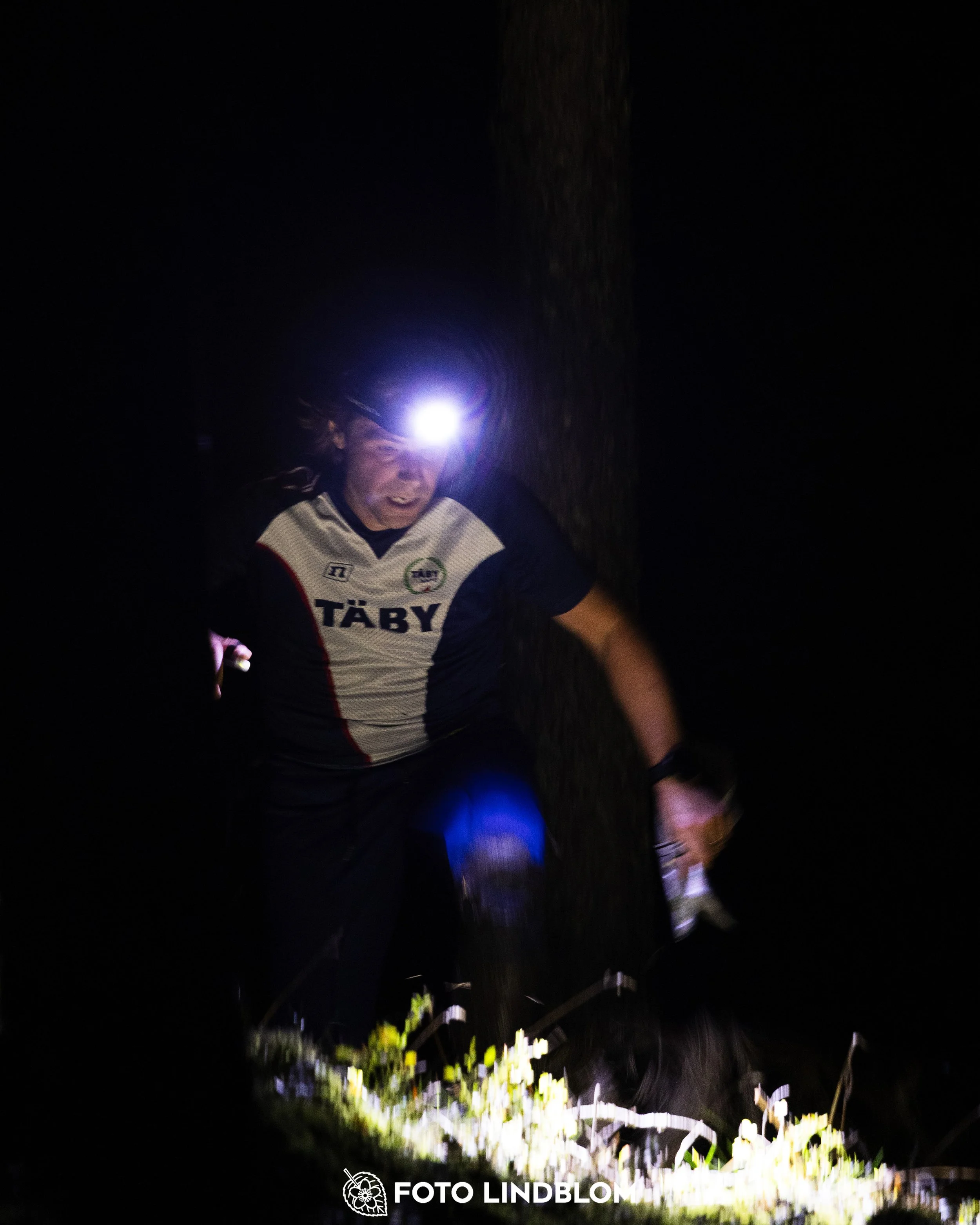 A picture from the Stockholm district championship in night orienteering taken by Foto Lindblom