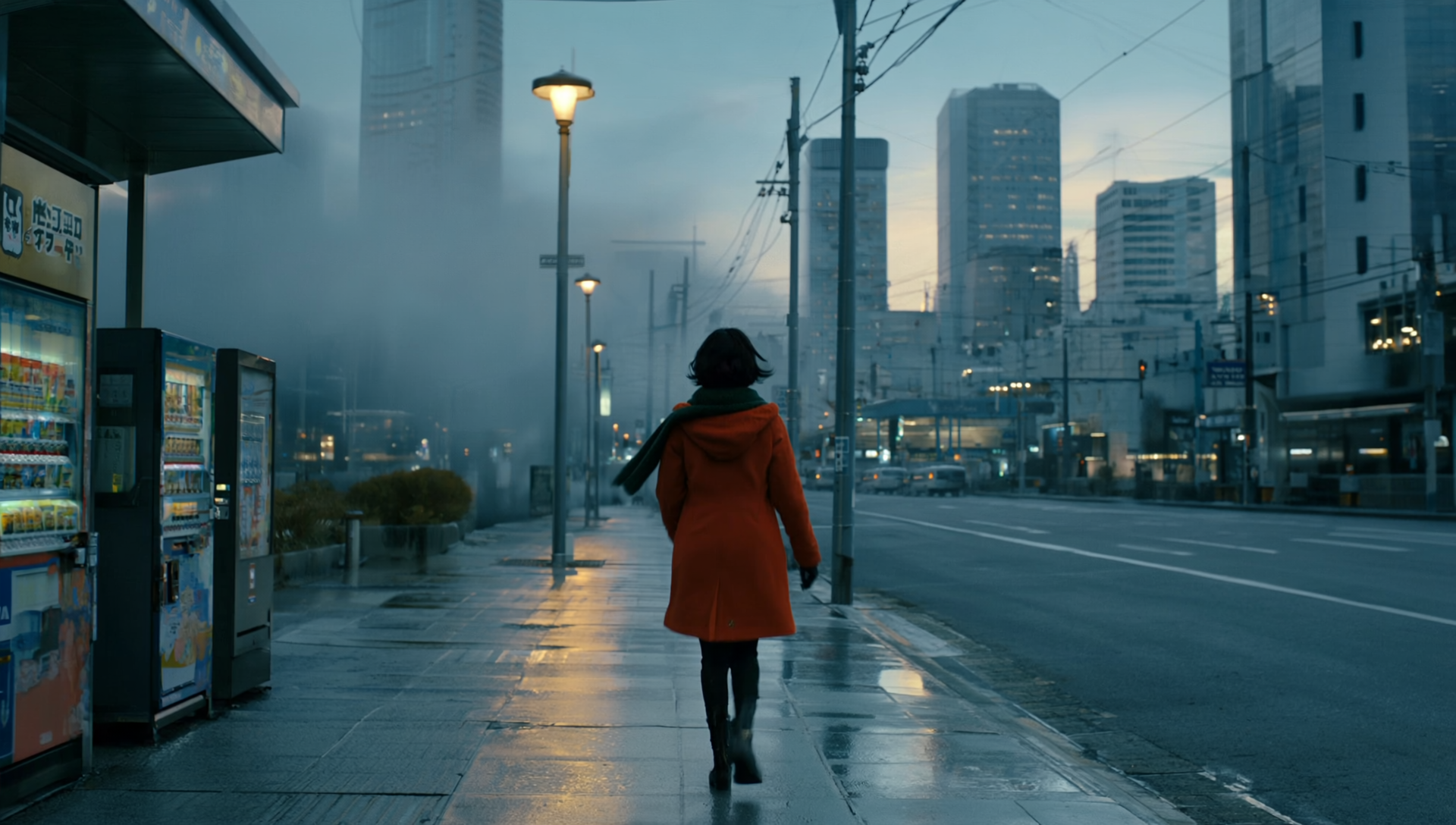 A cinematic wide shot of a quiet Tokyo sidewalk just before sunrise