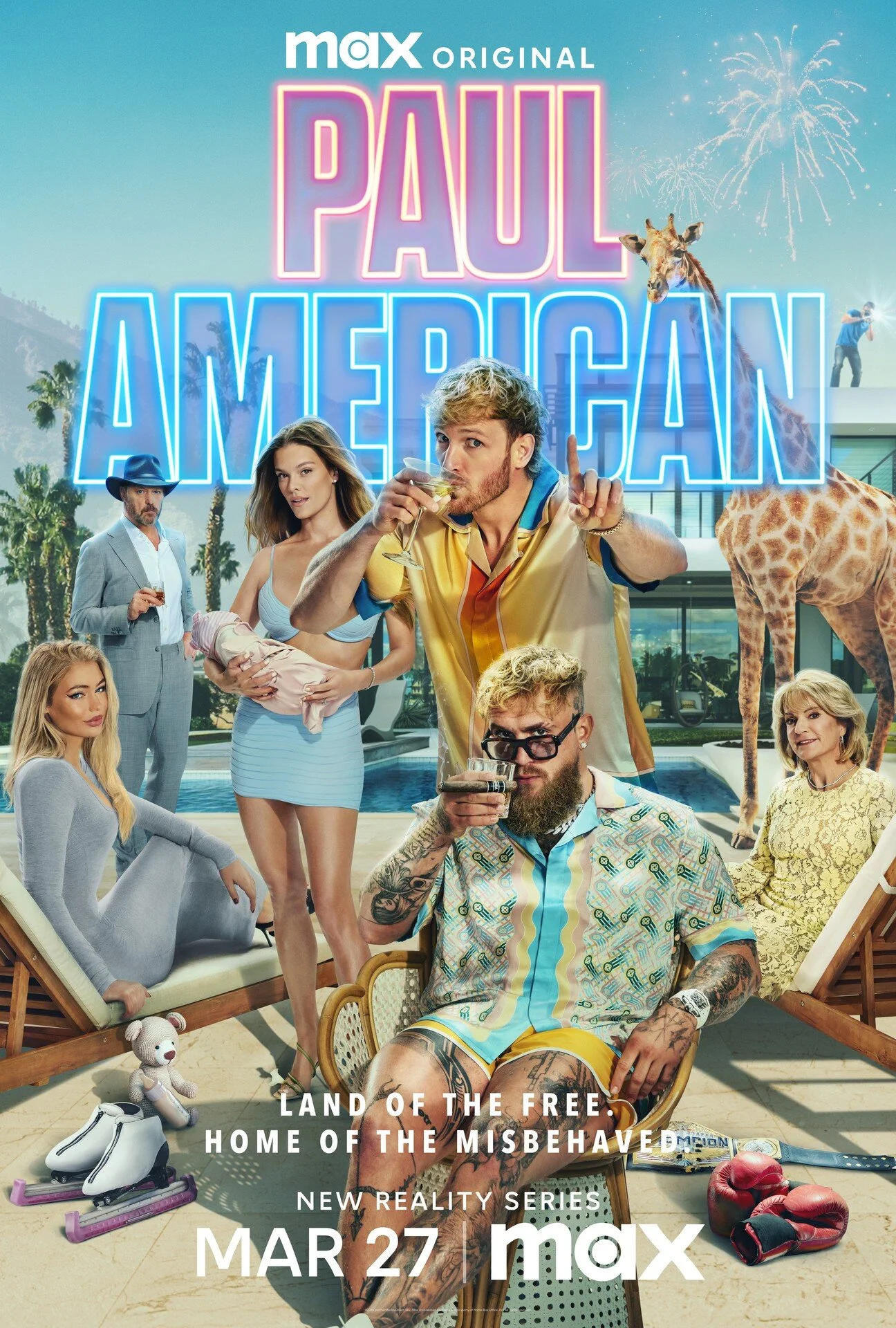 Promotional poster for the Max original reality series 'Paul American,' showing a group of diverse adults at a lavish outdoor pool area with palm trees and fireworks in the background. Two characters in the foreground are drinking cocktails, one with