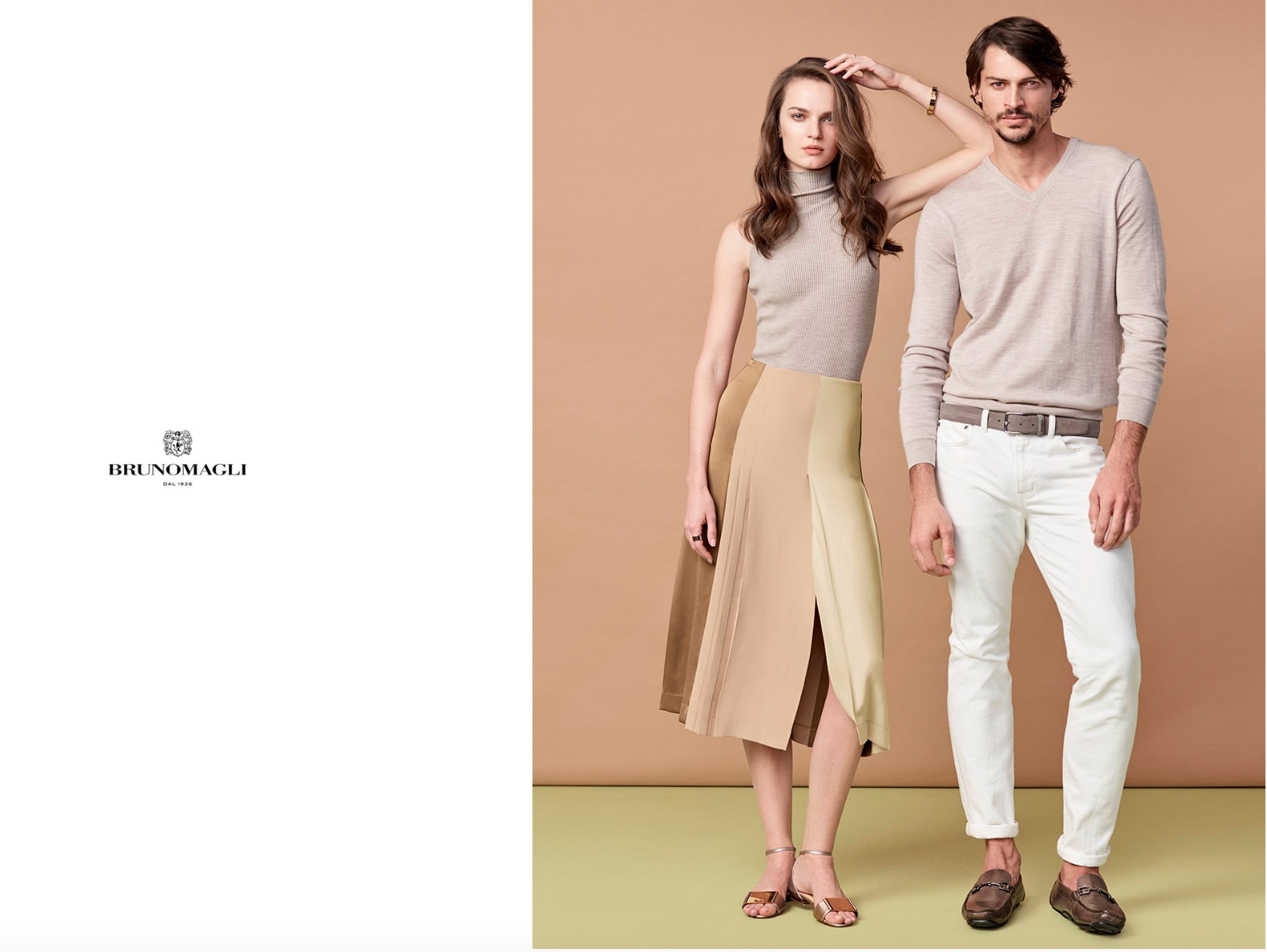 Fashion models posing against a beige background, showcasing neutral-toned clothing styles, with the left side of the image displaying the Bruno Magli logo.