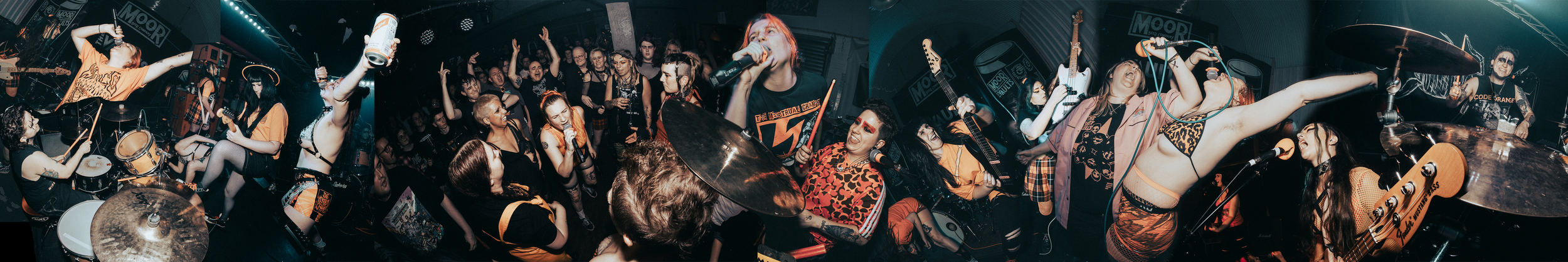 A lively live music performance at a concert with musicians playing instruments like drums, guitar, and bass, and the audience dancing and enjoying the show.