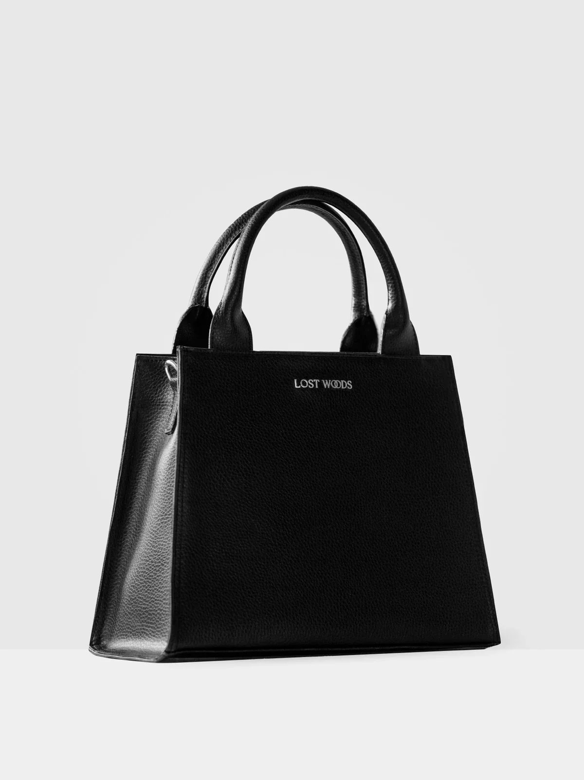lost-woods-ebony-black-silver-sustainable-vegan-leather-tote-bag-side.jpg.webp