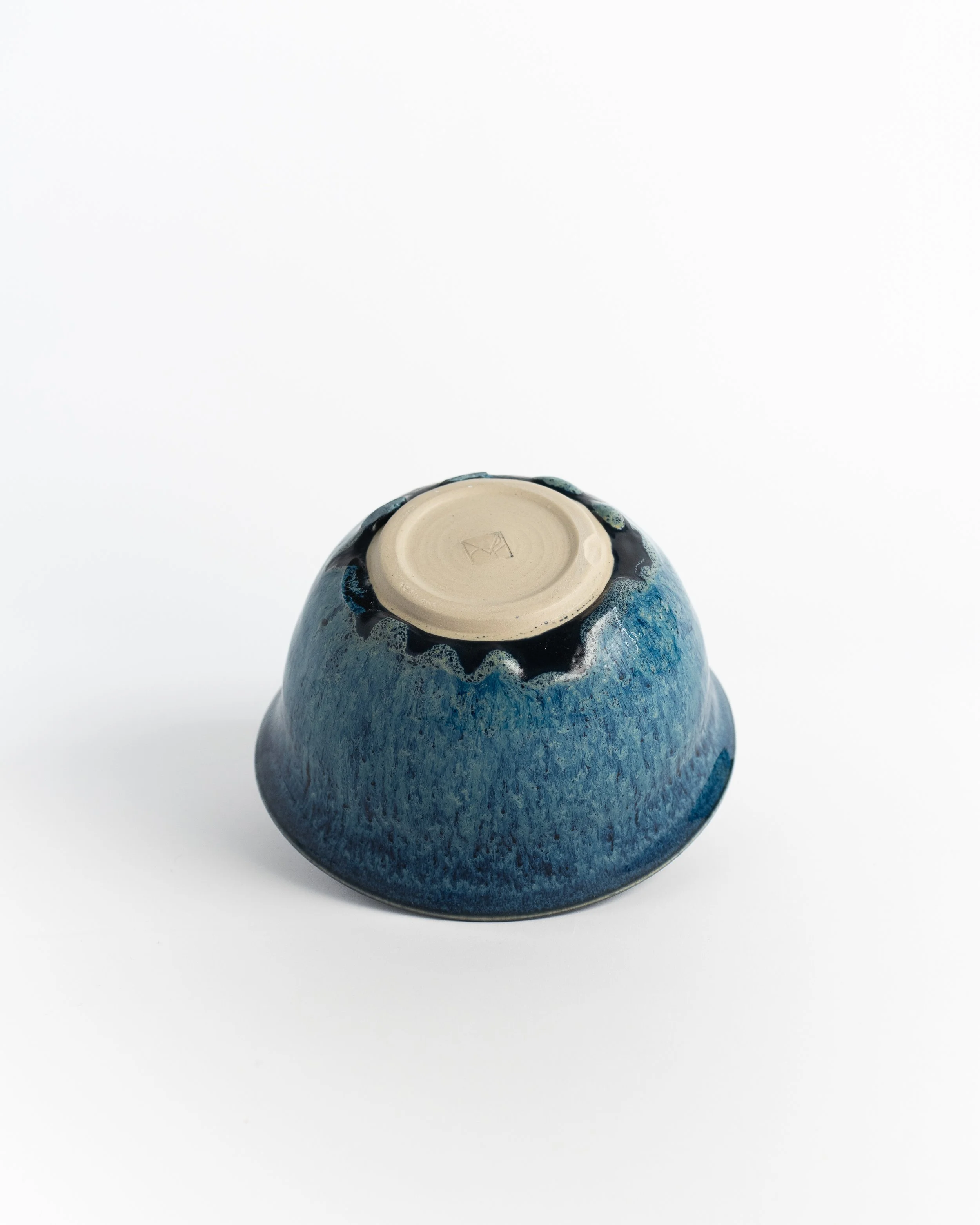 Underside of Deep Blue showing the unglazed foot and maker's mark.